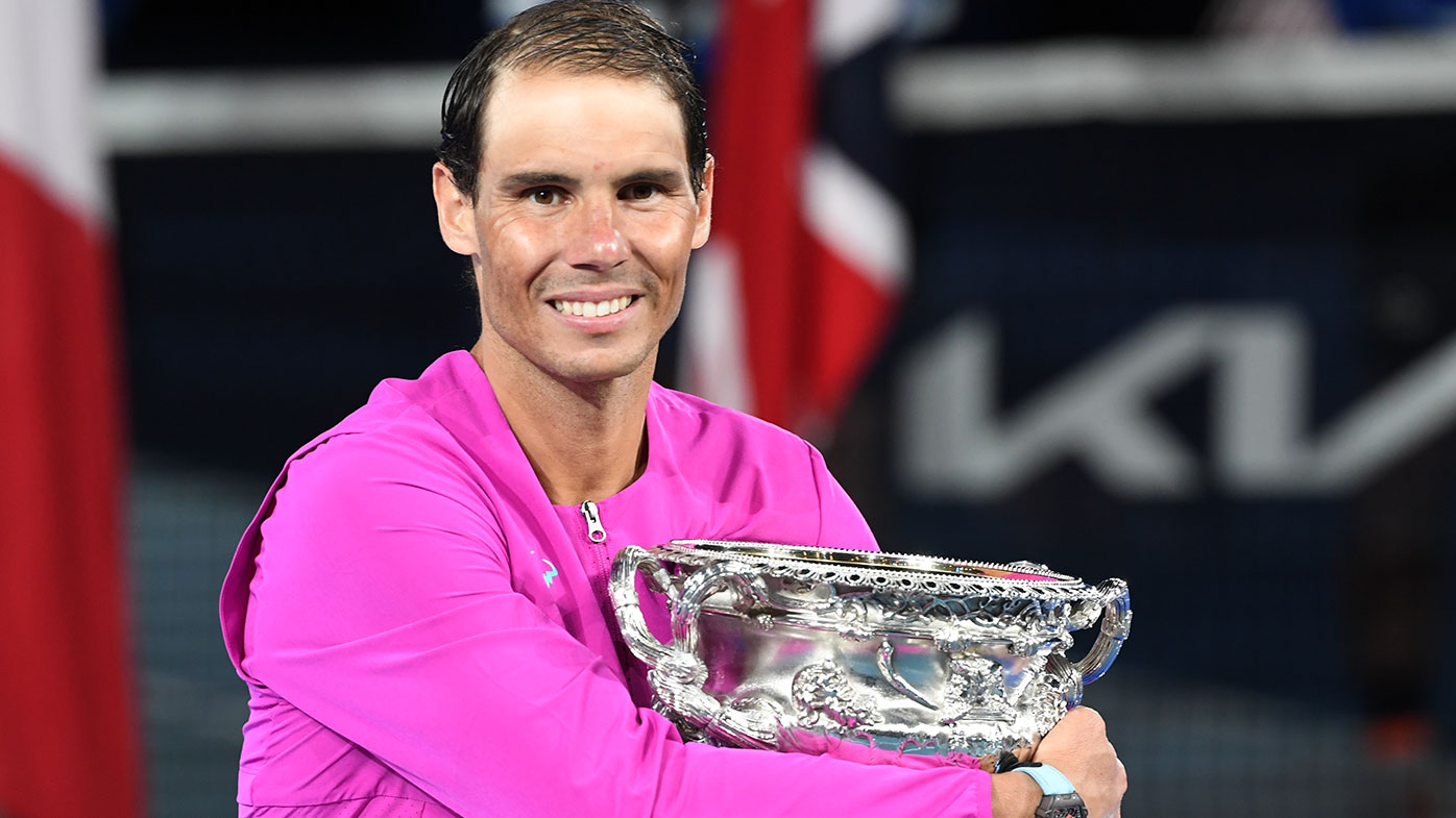 Rafael Nadal of Spain poses with the Norman Brookes Challenge Cup as he celebrates victory in his Men's Singles Final 