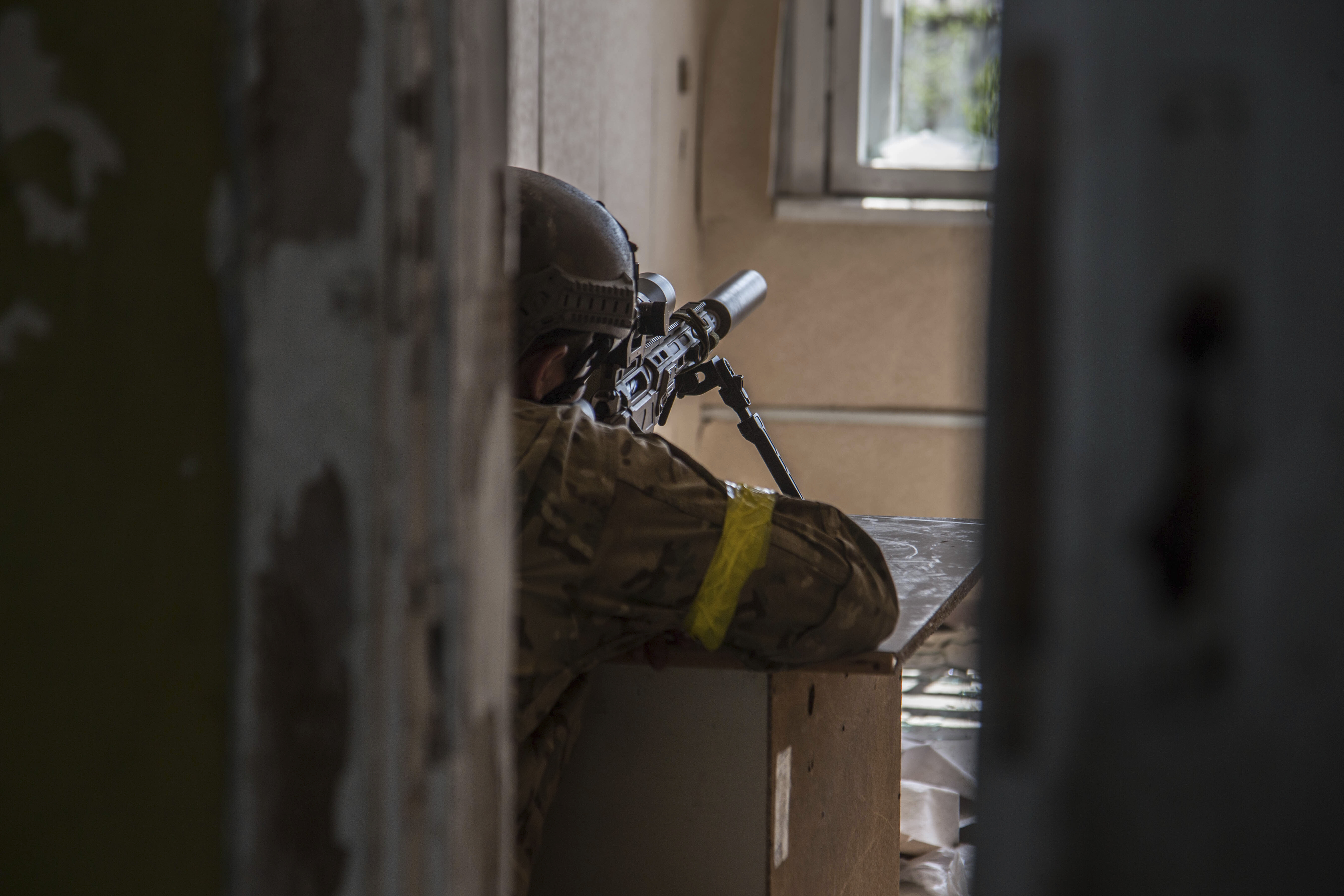A Ukrainian soldier is in position during heavy fighting on the front line in Severodonetsk, the Luhansk region, Ukraine, Wednesday, June 8, 2022.