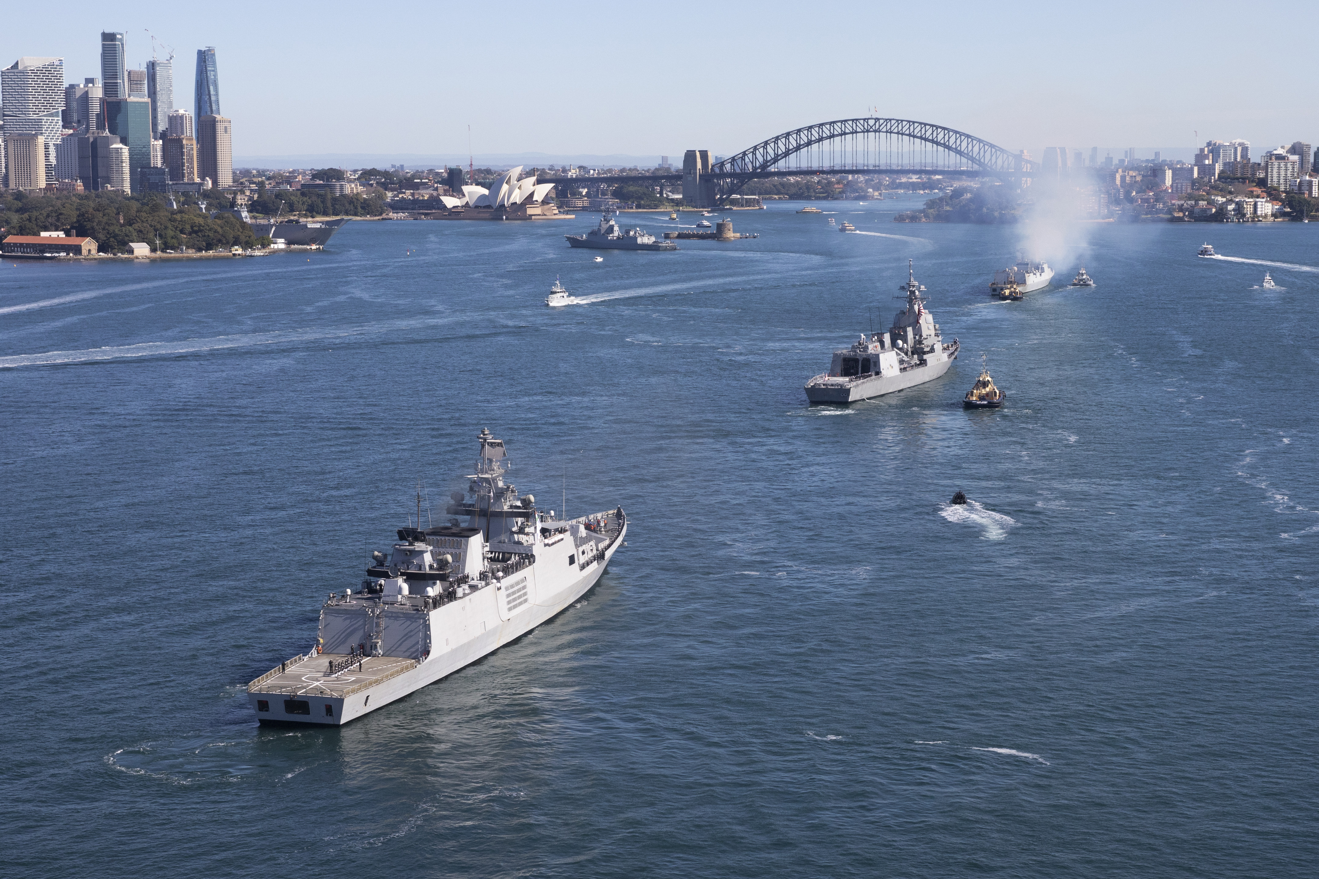 Navy vessels during military exercises in front of the Sydney Harbour Bridge