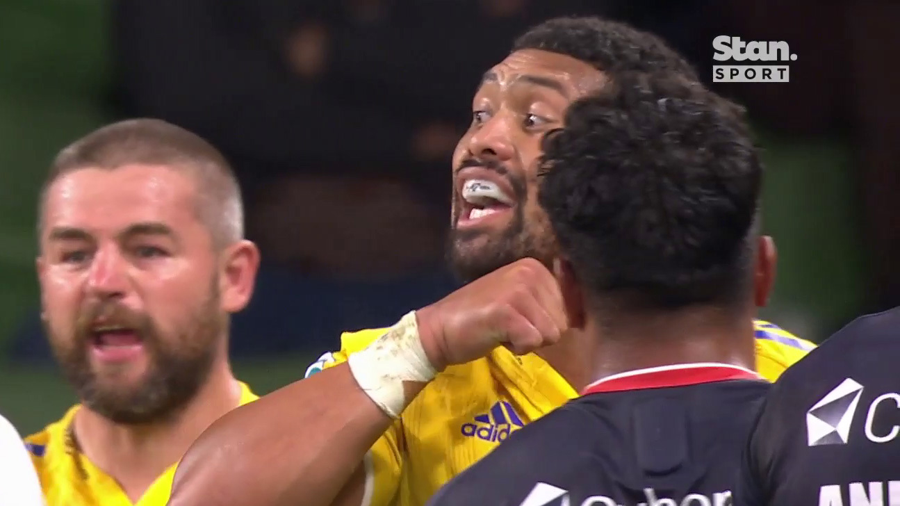 Ardie Savea makes a throat-slitting gesture after receiving a yellow card.