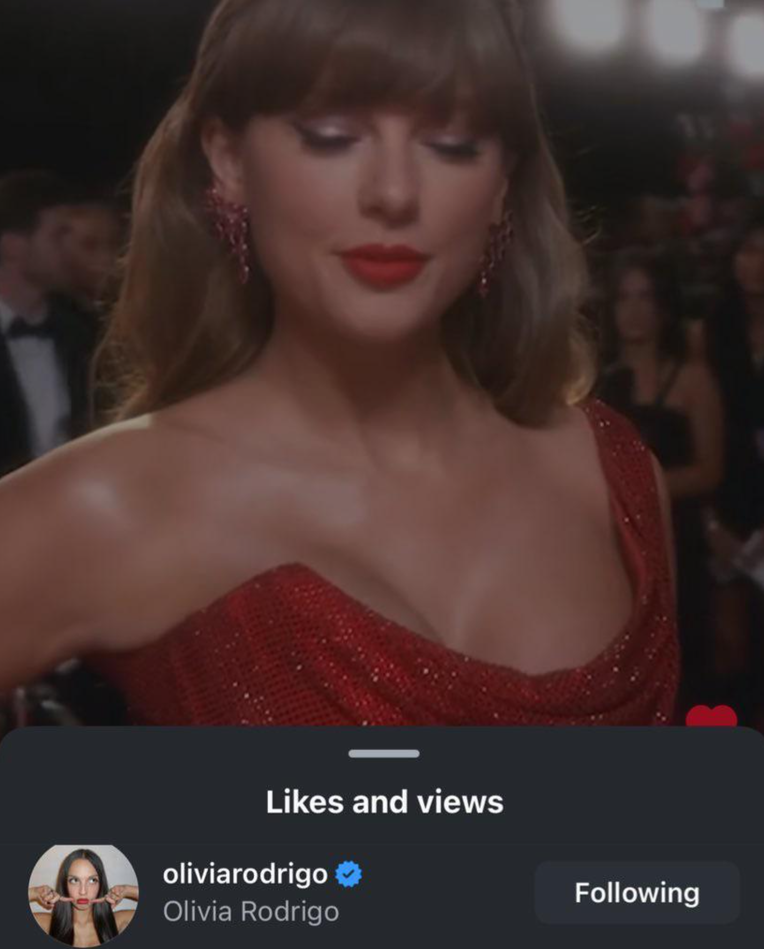 A screenshot of Olivia Rodrigo liking a video of Taylor Swift on the red carpet at the 2025 Grammys.