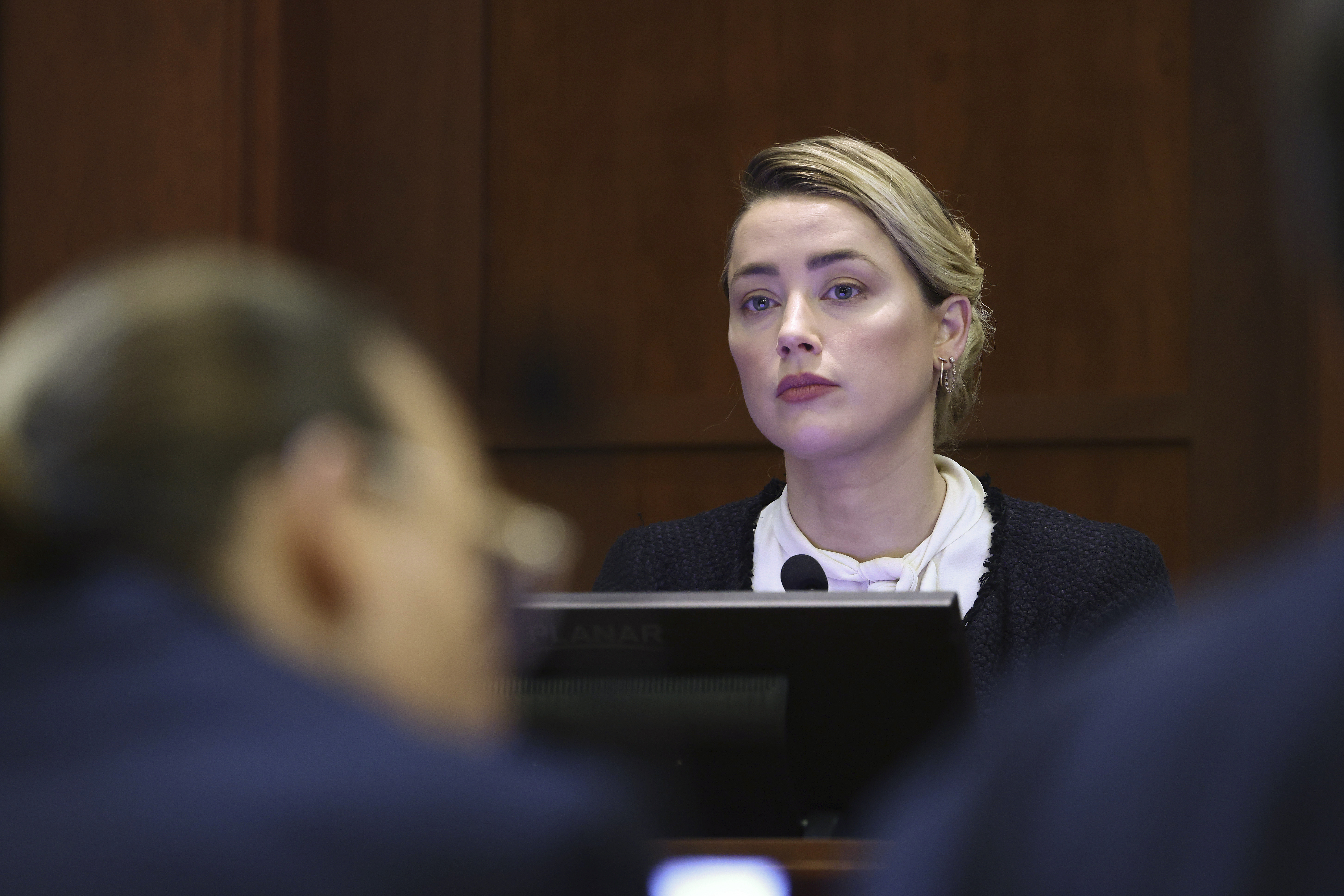 US actress Amber Heard reacts on the stand during the 50 million US dollar Depp vs Heard defamation trial at the Fairfax County Circuit Court in Fairfax, Virginia, USA, 05 May 2022. 