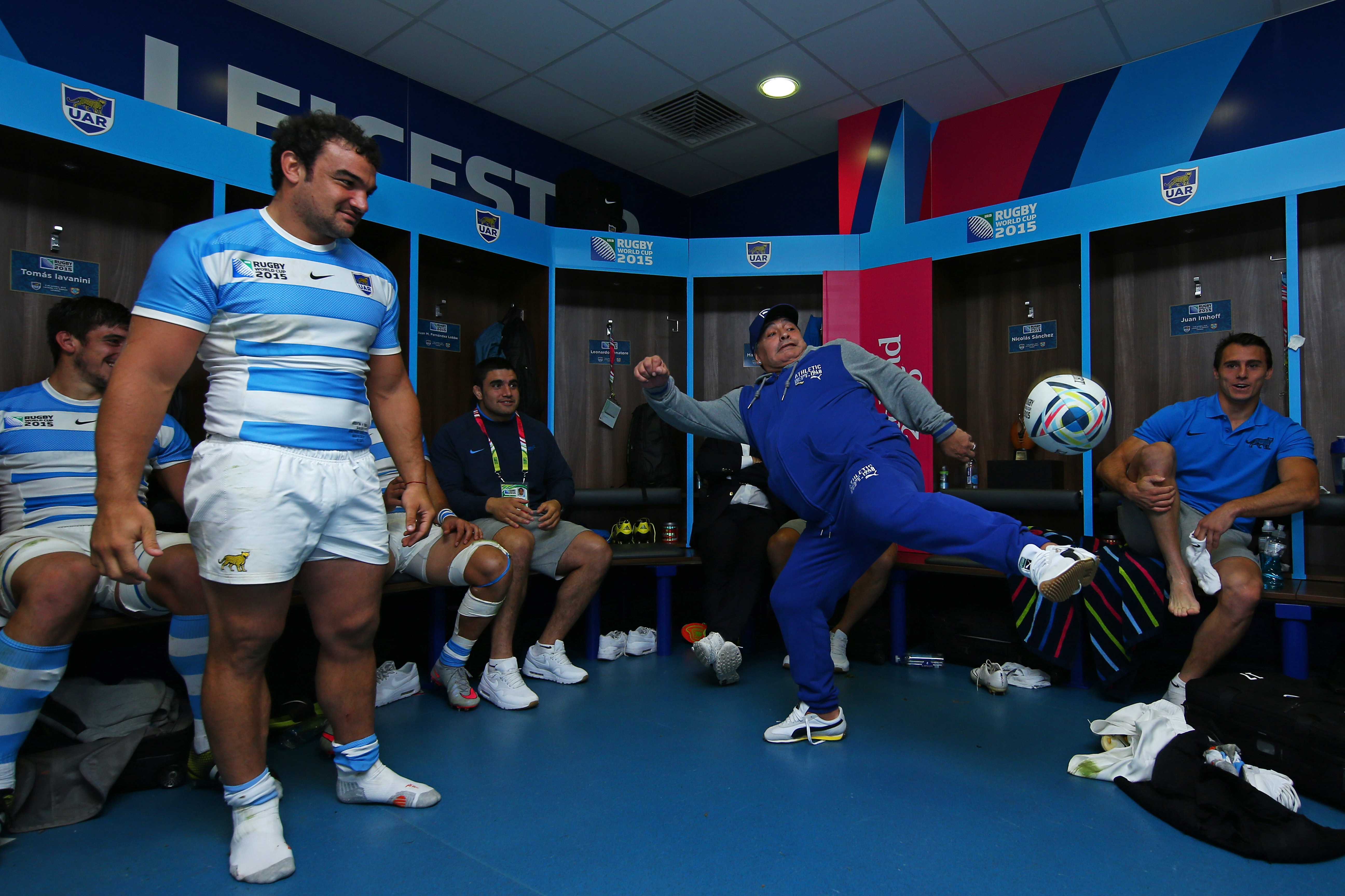 Diego Maradona juggles a ball during the 2015 Rugby World Cup.