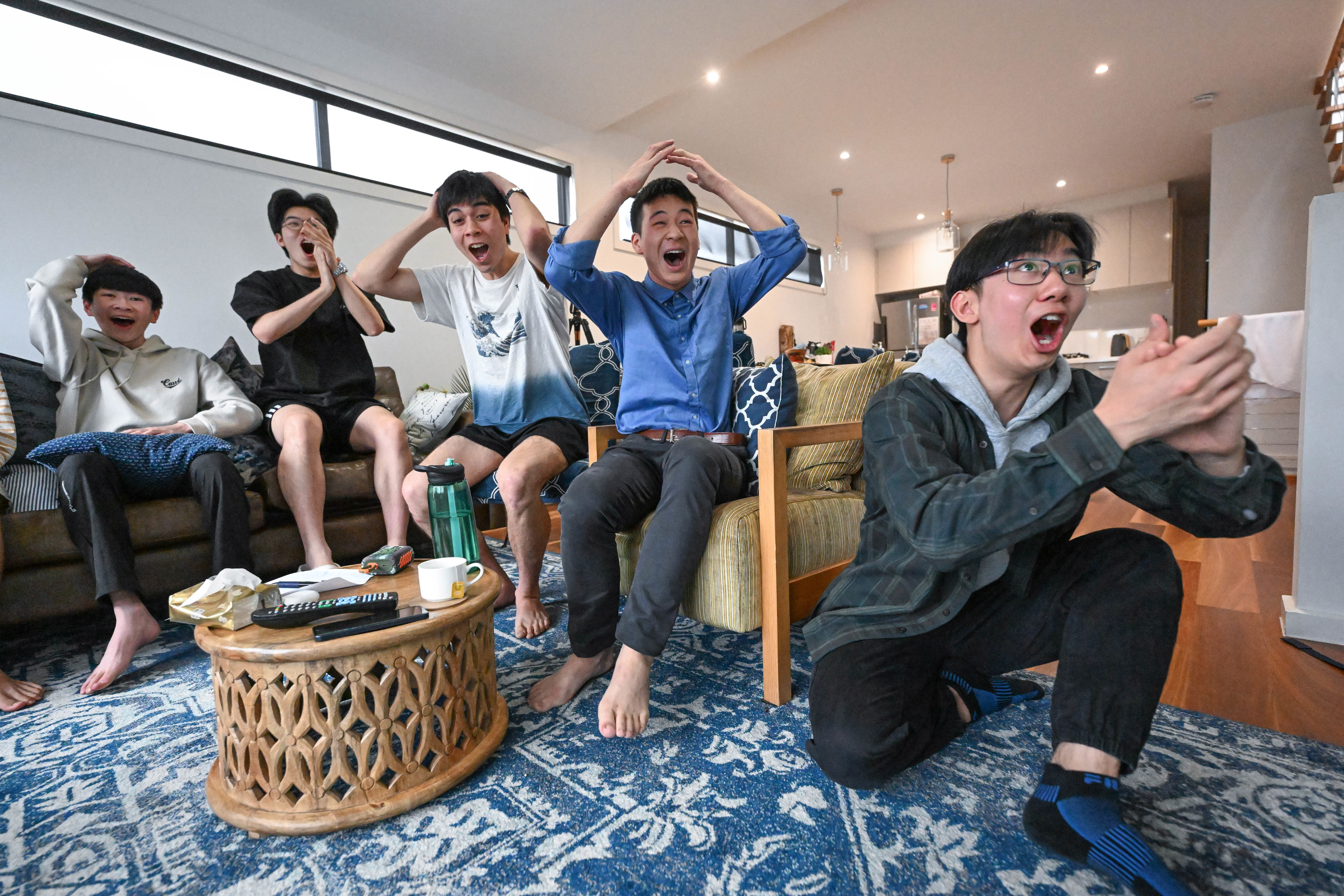 The moment group of nine Melbourne High boys open their ATAR results together in 2024.