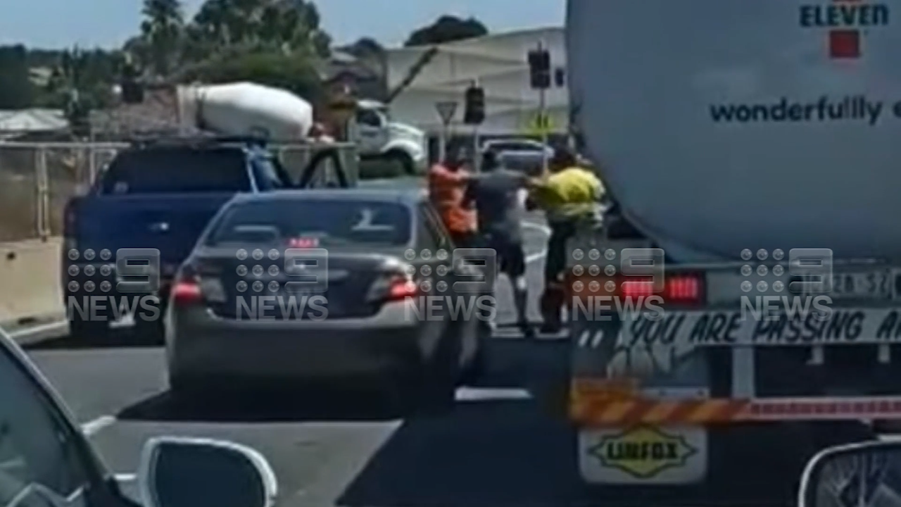 Two men caught fighting on West Gate Bridge in Melbourne.