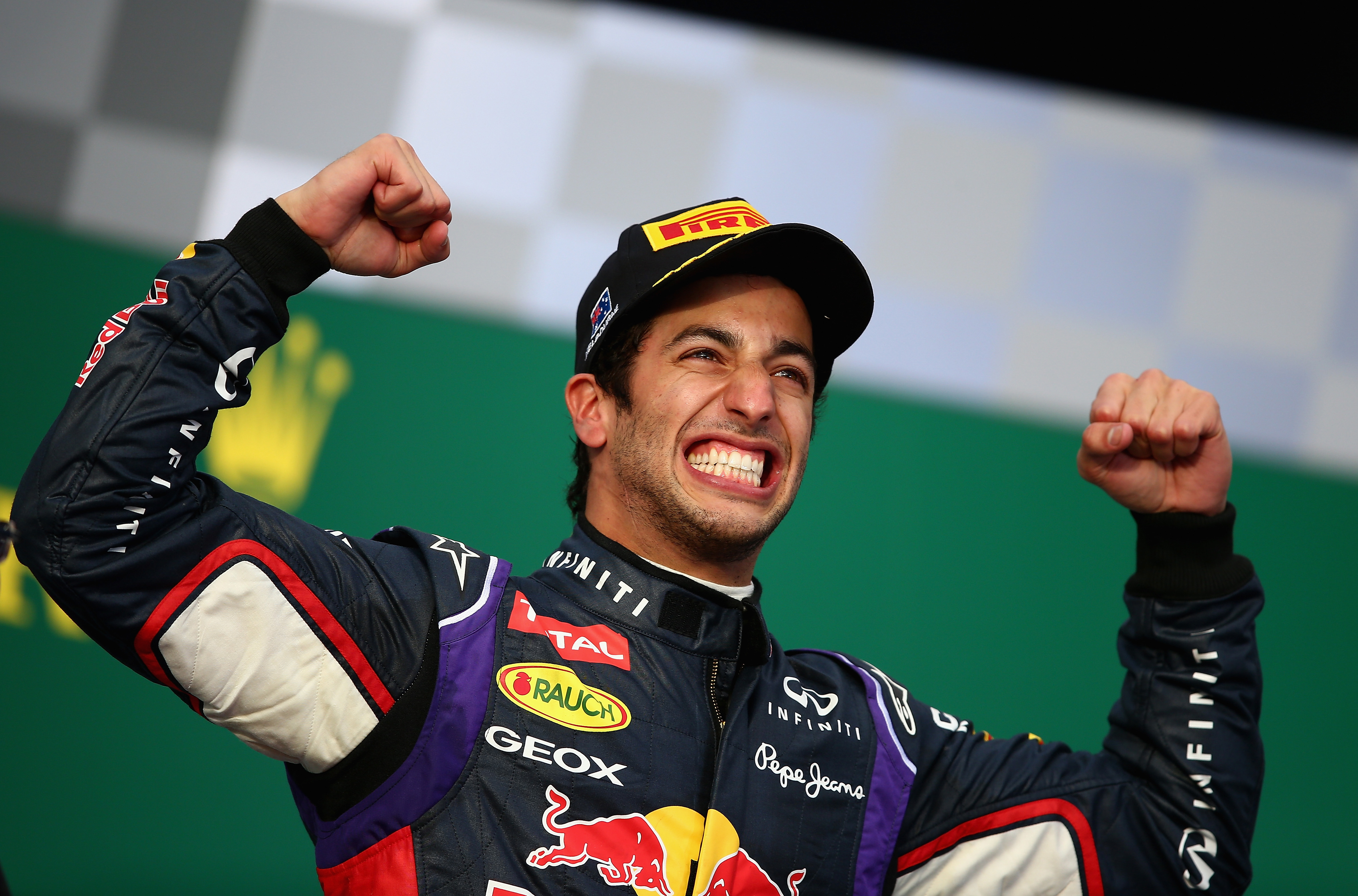 Daniel Ricciardo stands on the podium in the 2014 Australian Grand Prix.