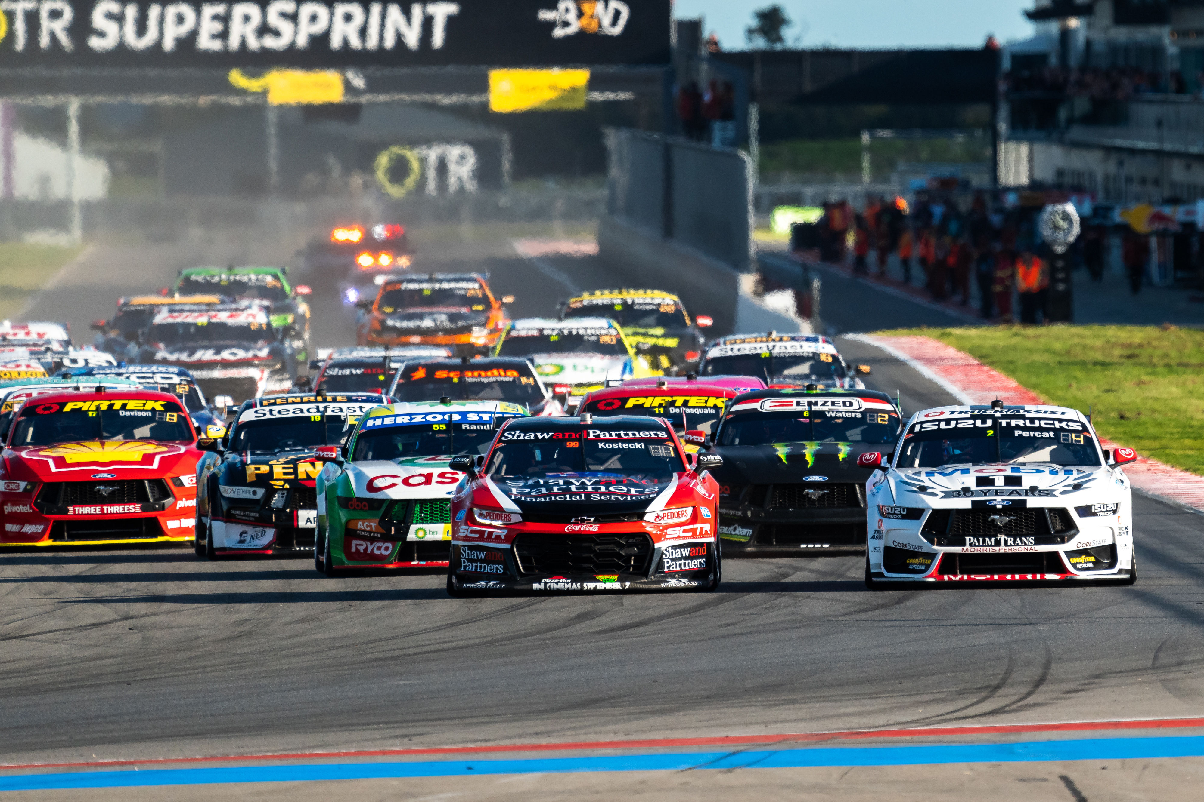 Brodie Kostecki leads the Supercars field into turn one at The Bend Motorsport Park.