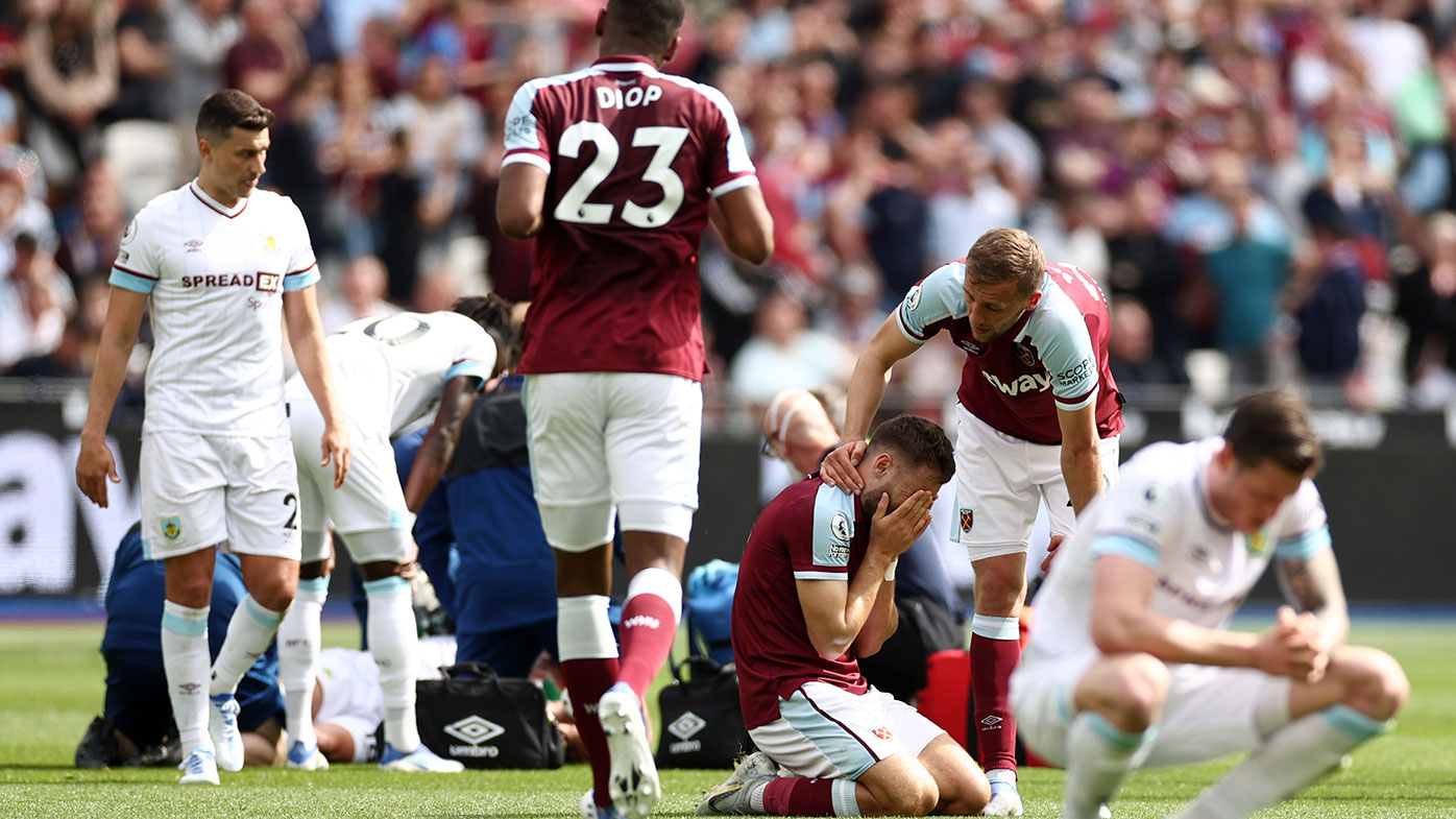 Nikola Vlasic of West Ham United reacts after clashing with Ashley Westwood of Burnley 