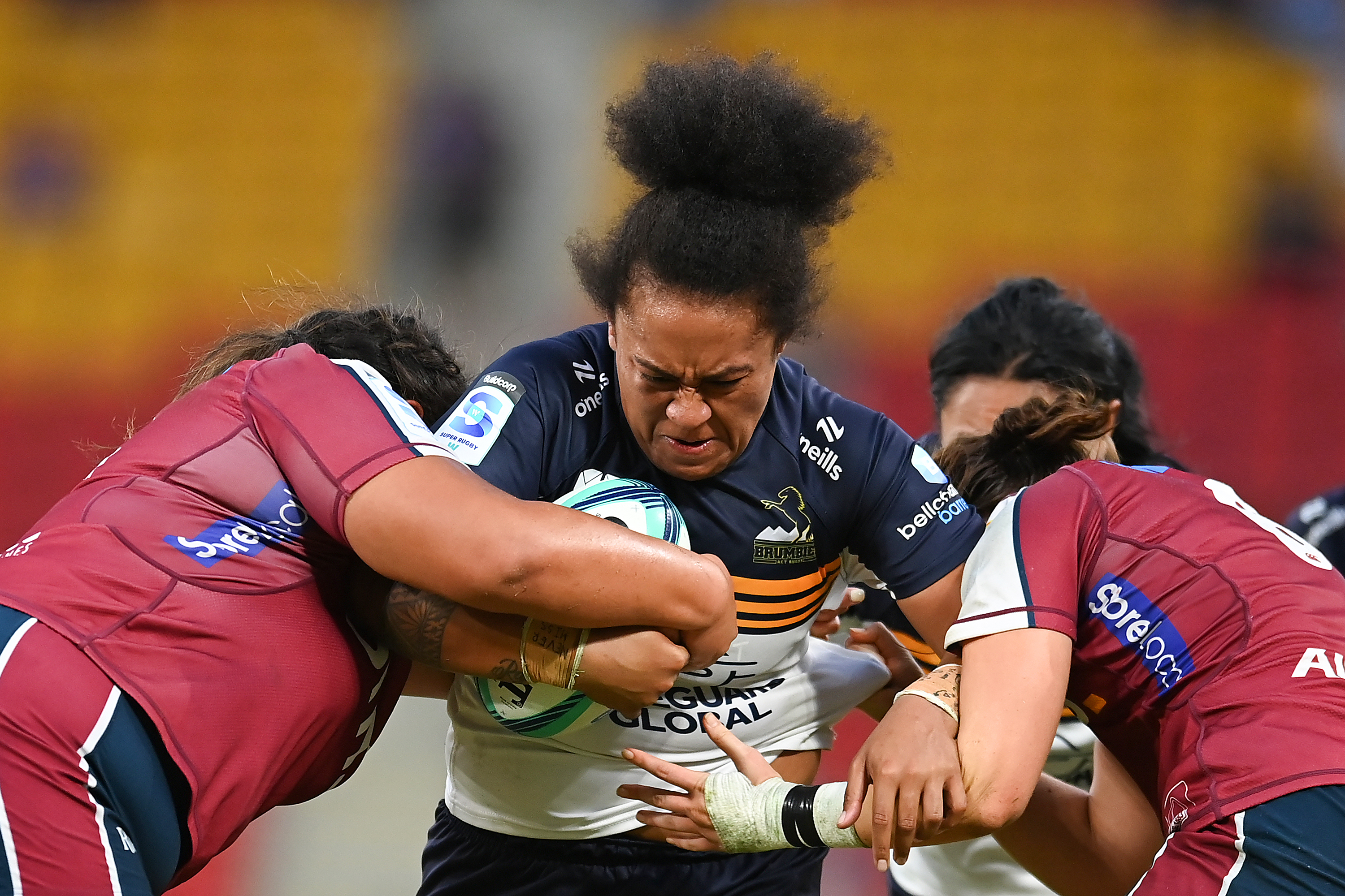 Lydia Kavoa of the Brumbies is tackled at Suncorp Stadium.