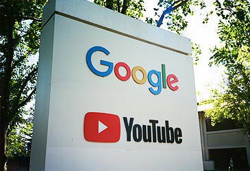 Sign displaying Google and YouTube logos at Googleplex, Mountain View (Smith Collection/Getty)
