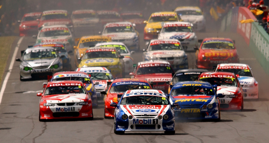 Glenn Seton in the Ford Tickford Racing AU Falcon leads the pack down the straight into the first corner of the Bathurst 1000 at Mount Panorama.