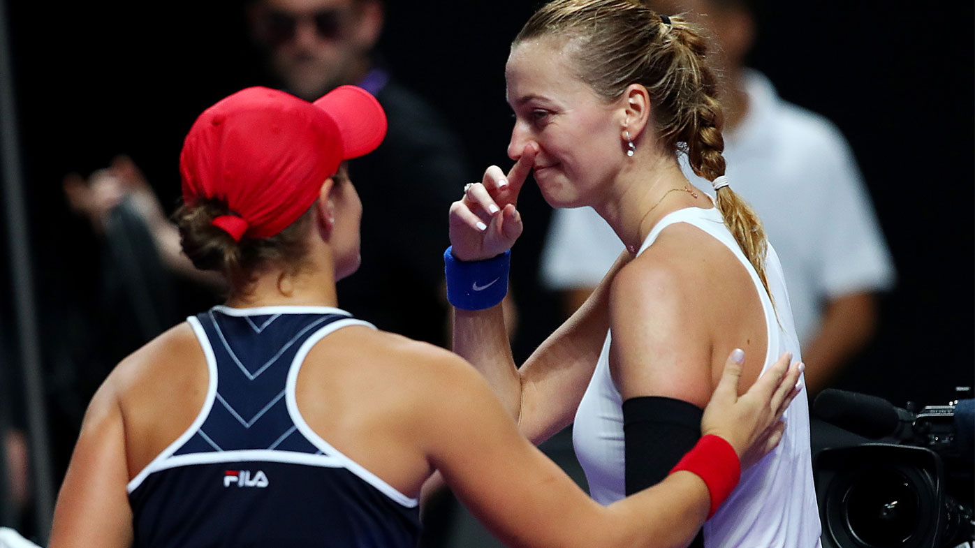 Ashleigh Barty (L) of Australia is congratulated by Petra Kvitova of the Czech Republic