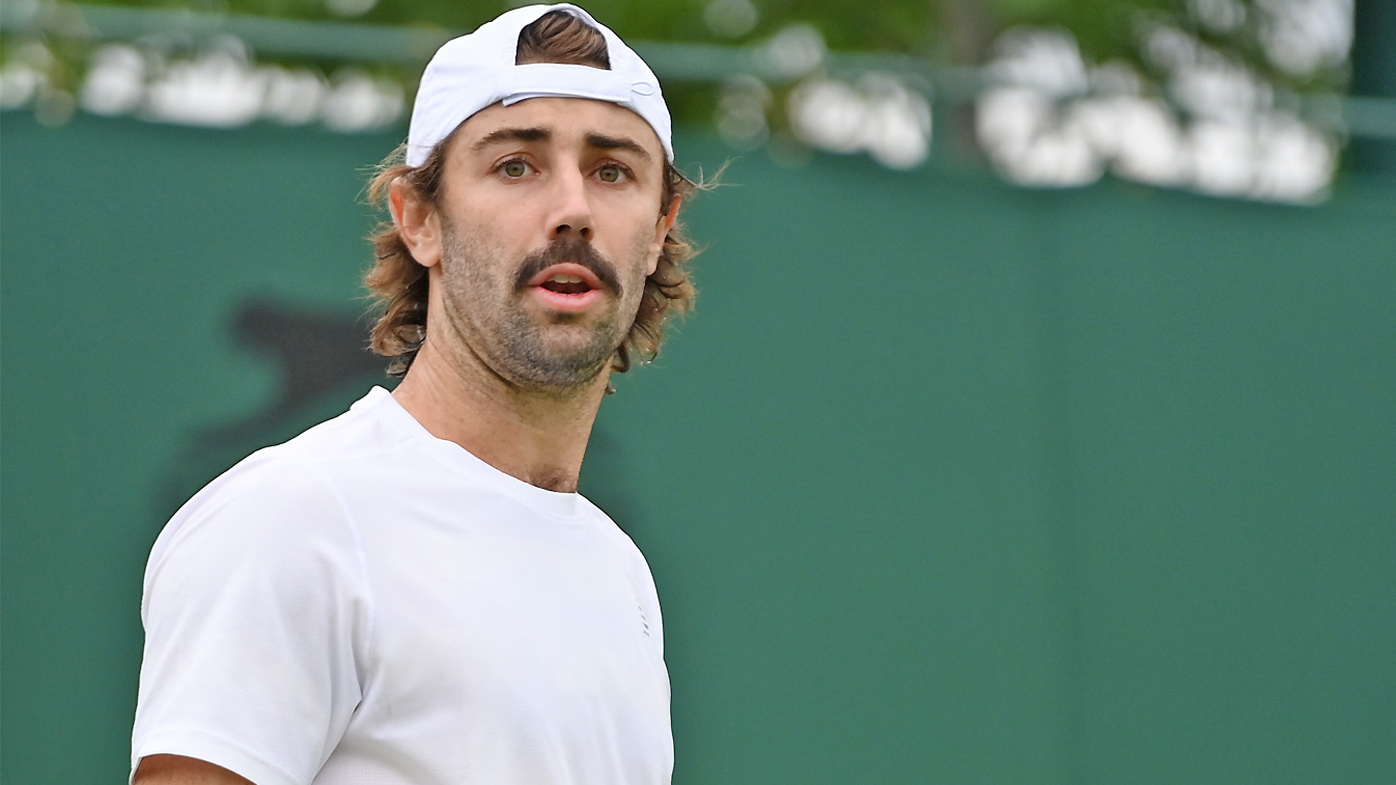 Jordan Thompson of Australia plays a forehand in his Men's Singles First Round match against Casper Ruud