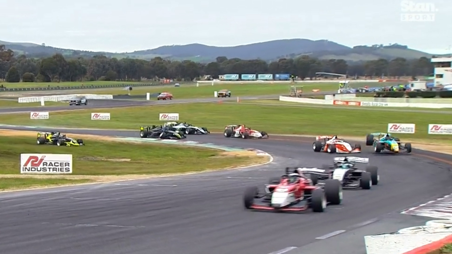 Mark Rosser (right) flies through the air while Cooper Webster (left) goes through the grass.