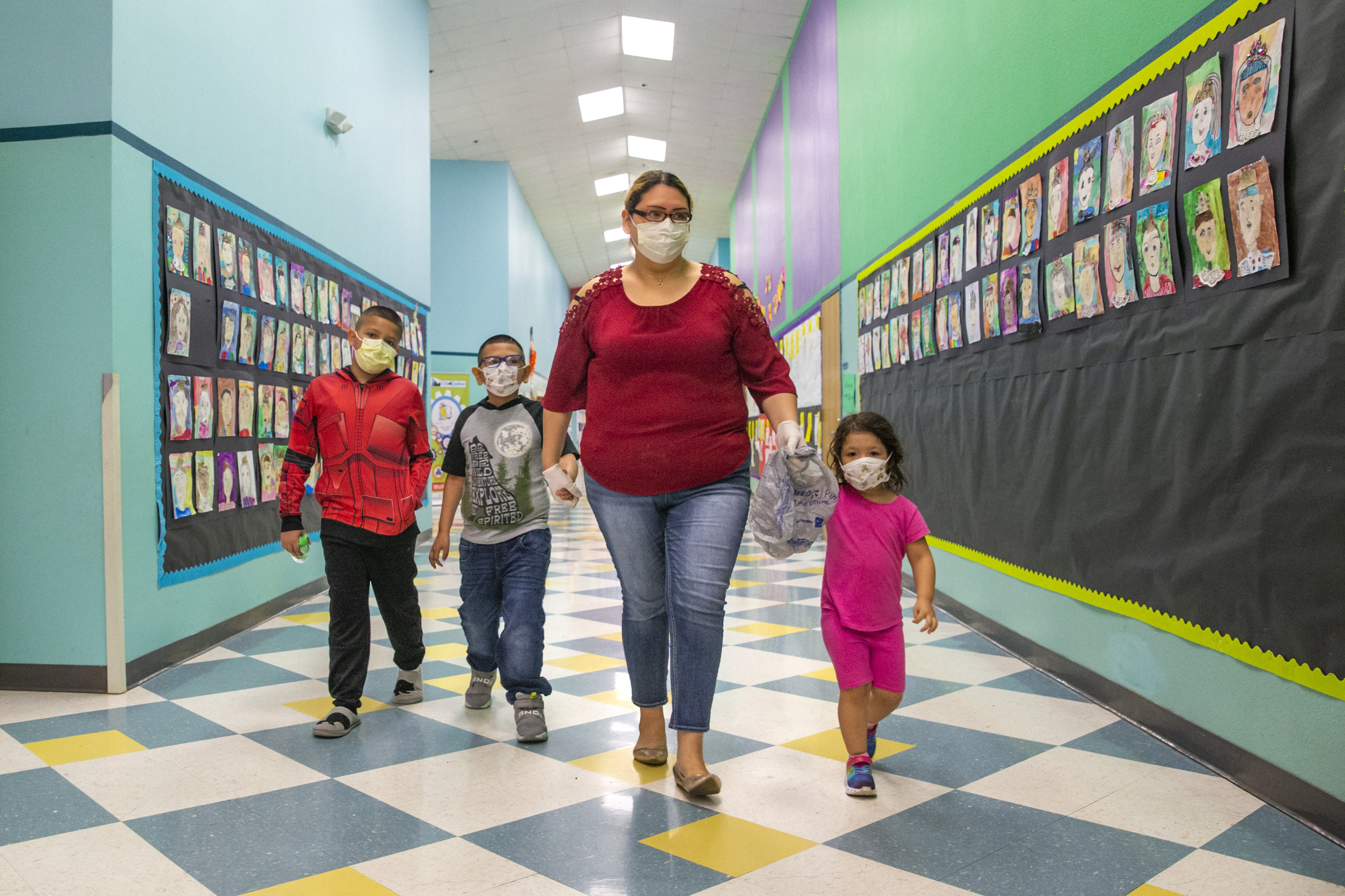 Children in the United States wear masks while at school.