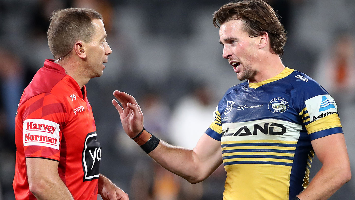 Clint Gutherson of the Eels talks to referee Ben Cummins