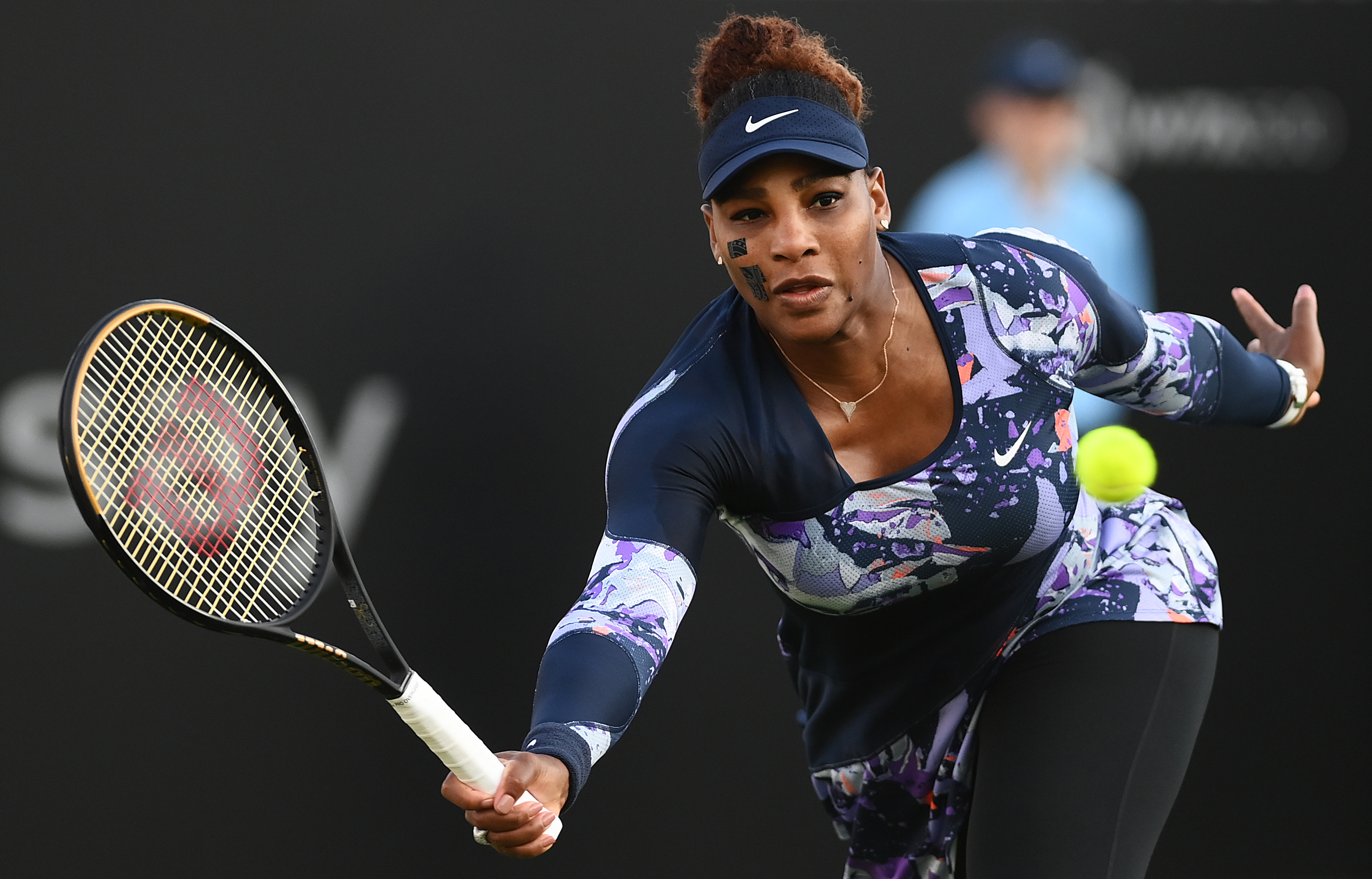 Serena Williams of United States of America plays a forehand during their Women's Doubles Round One match against Marie Bouzkova of Czech Republic and Sara Sorribes Tormo of Spain on Day 4 of the Rothesay International at Devonshire Park on June 21, 2022 in Eastbourne, England. (Photo by Mike Hewitt/Getty Images)