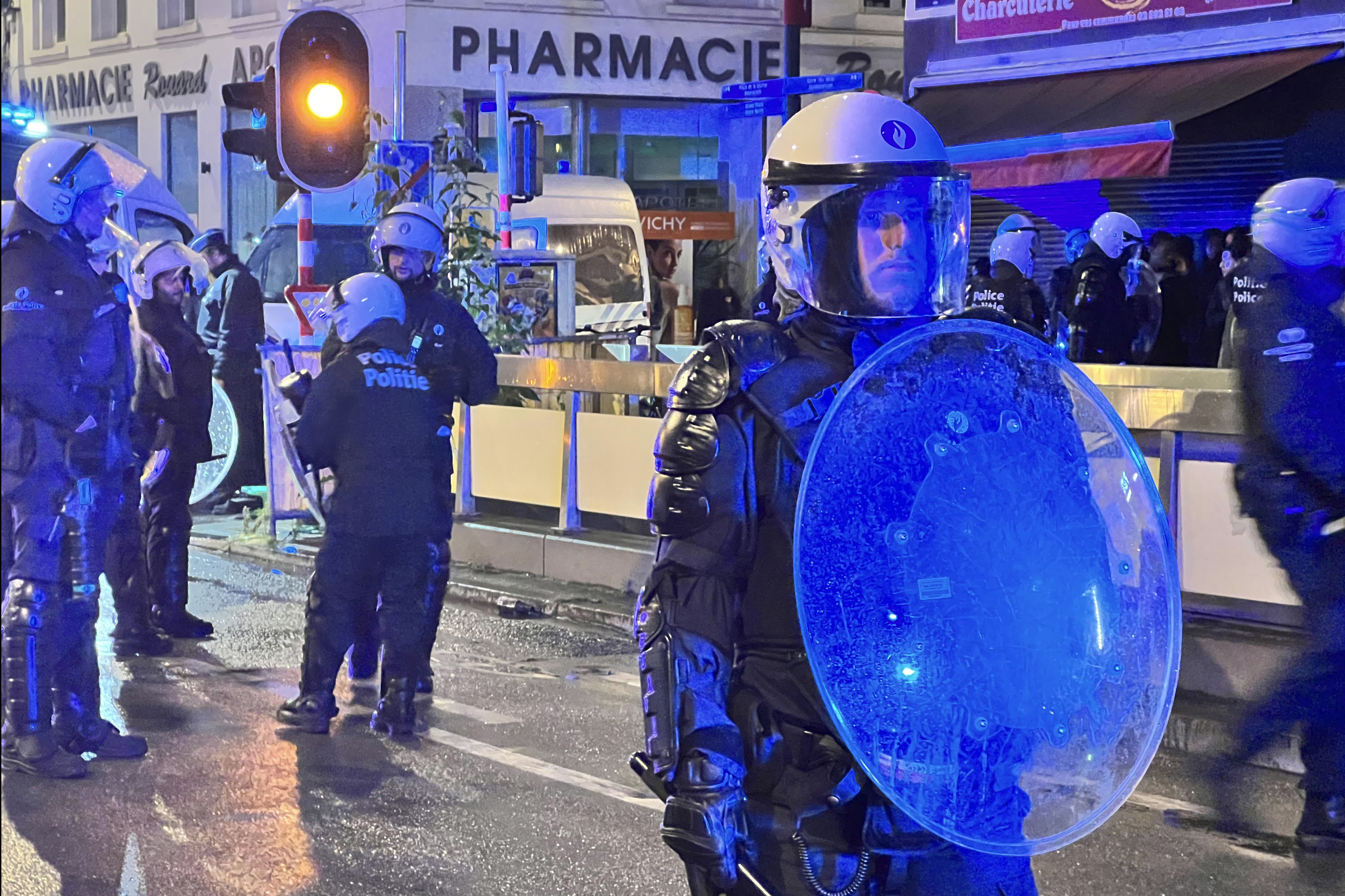 Police patrol in a street after scuffles in central Brussels, Thursday, June 29, 2023. 