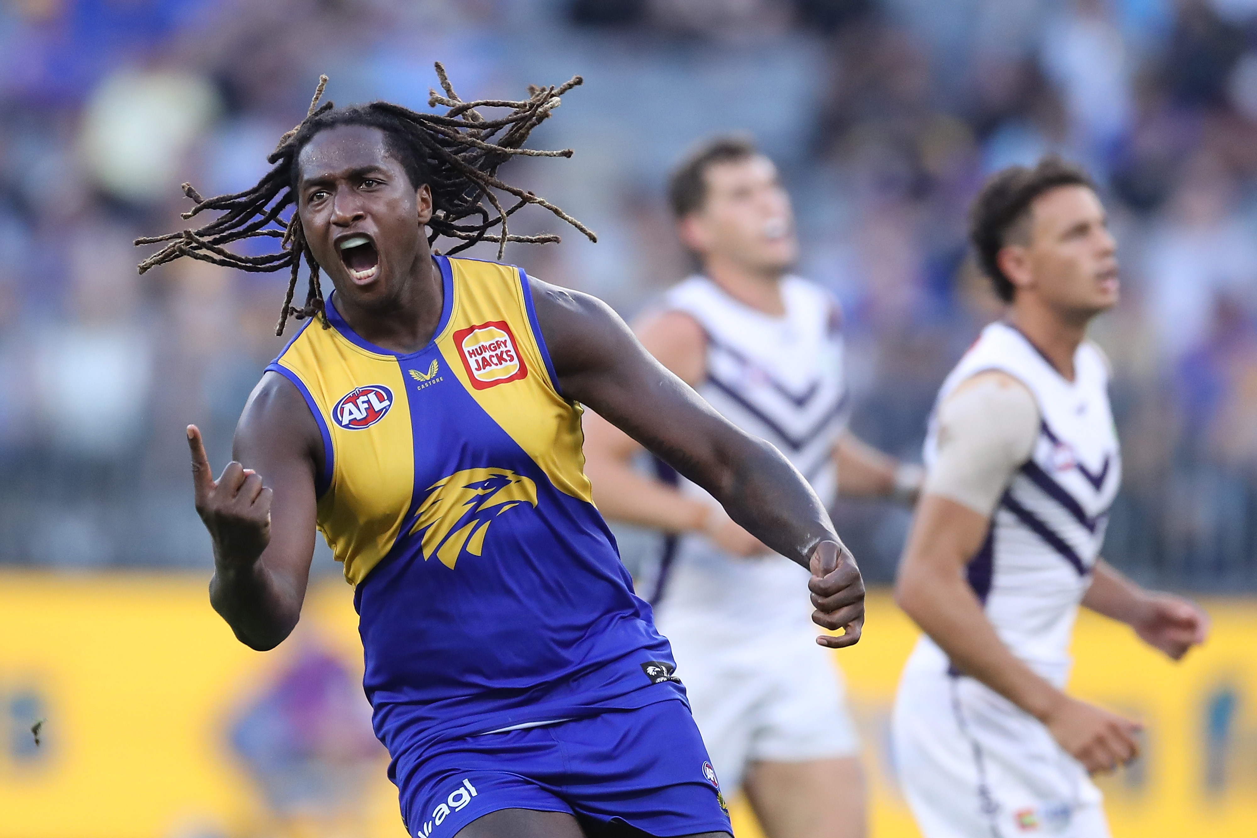 Nic Naitanui of the Eagles celebrates after scoring a goal during the 2022 AFL Round 03 match between the West Coast Eagles and the Fremantle Dockers at Optus Stadium on April 03, 2022 In Perth, Australia. (Photo by Will Russell/AFL Photos)