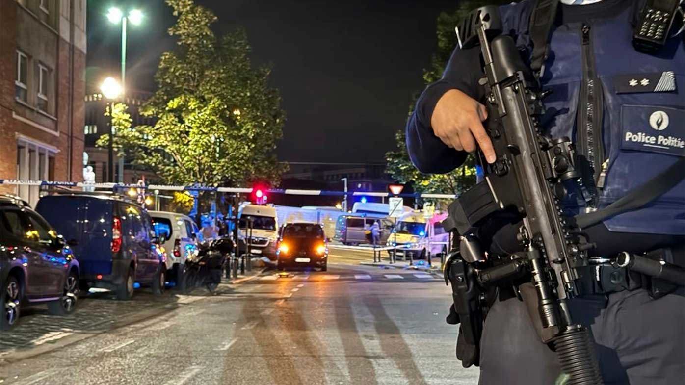 Police cordon off an area where a shooting took place in the centre of Brussels, Belgium.