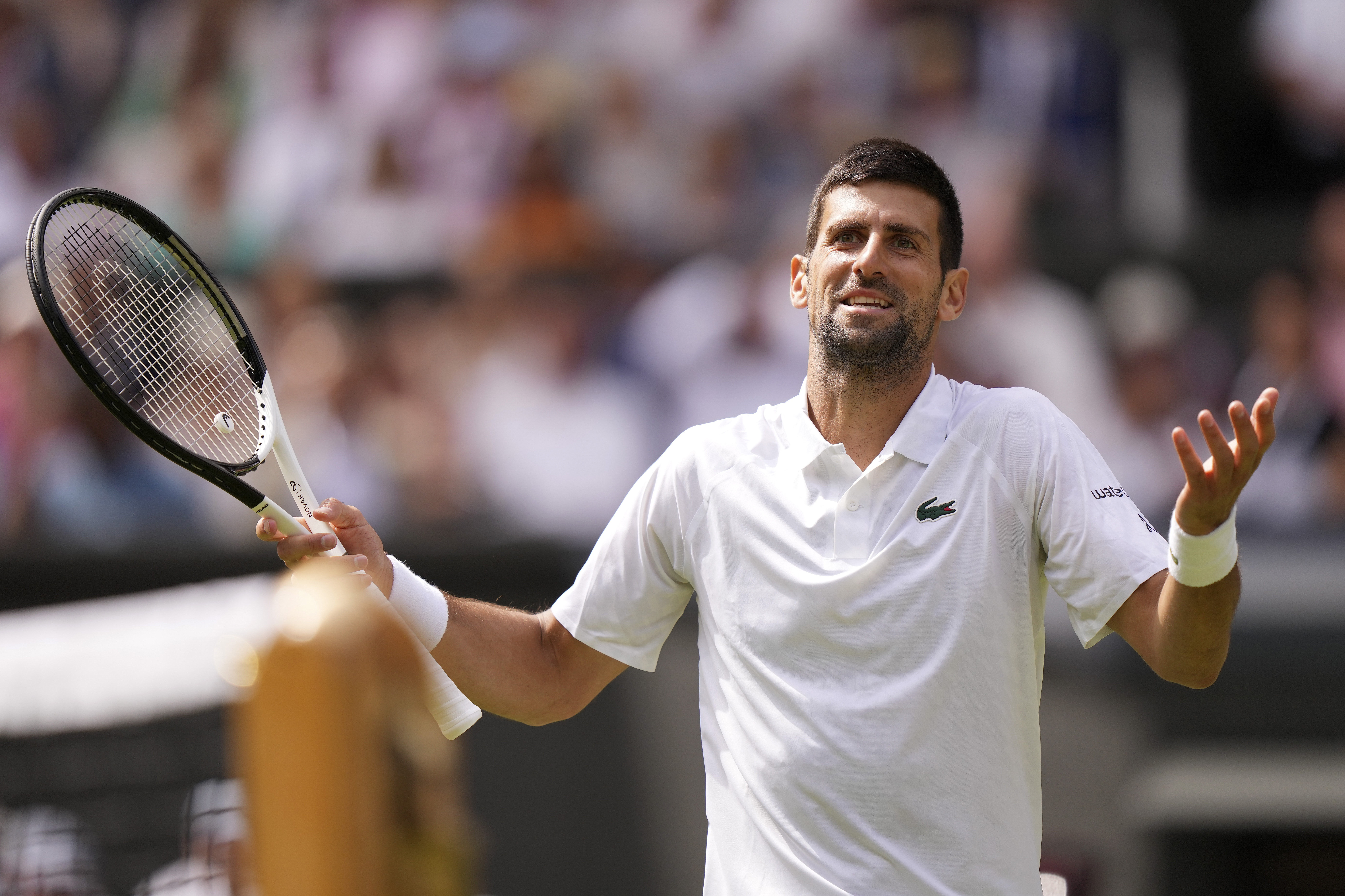 Serbia's Novak Djokovic reacts as he plays Poland's Hubert Hurkacz in the fourth round at Wimbledon.