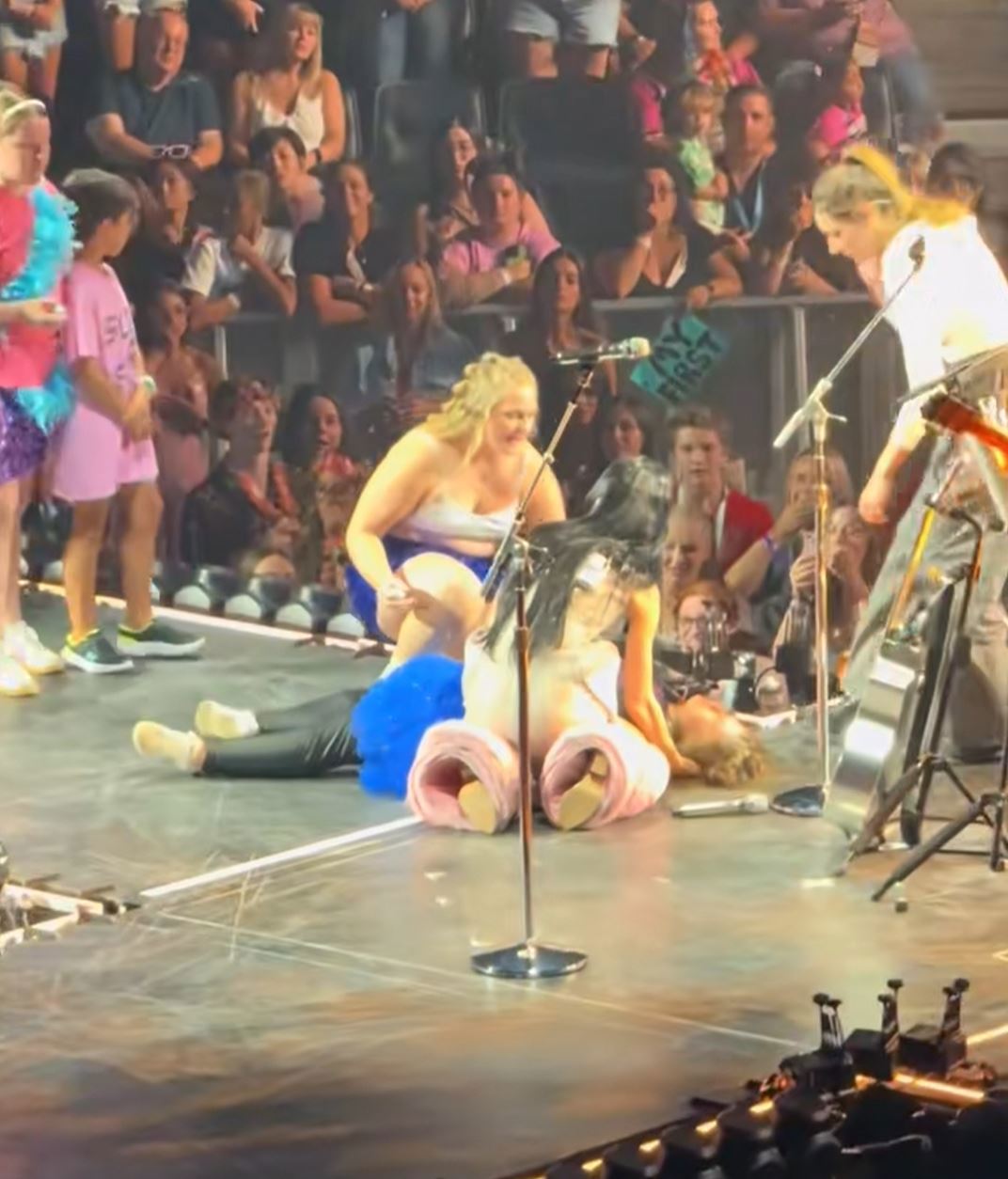 Katy Perry tends to fan onstage