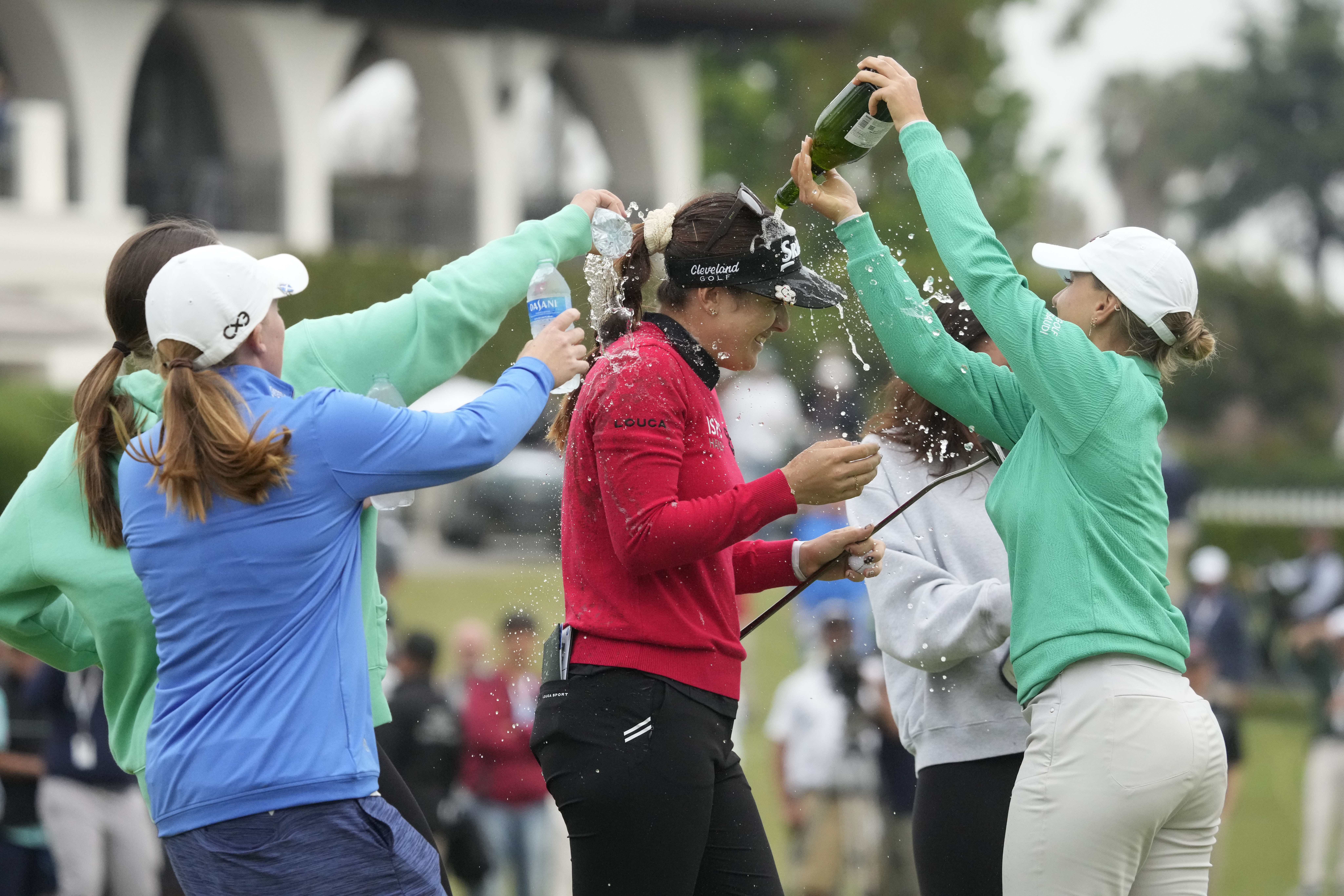 Hannah Green is doused on the 18th green after winning in a playoff at the LPGA LA Championship.