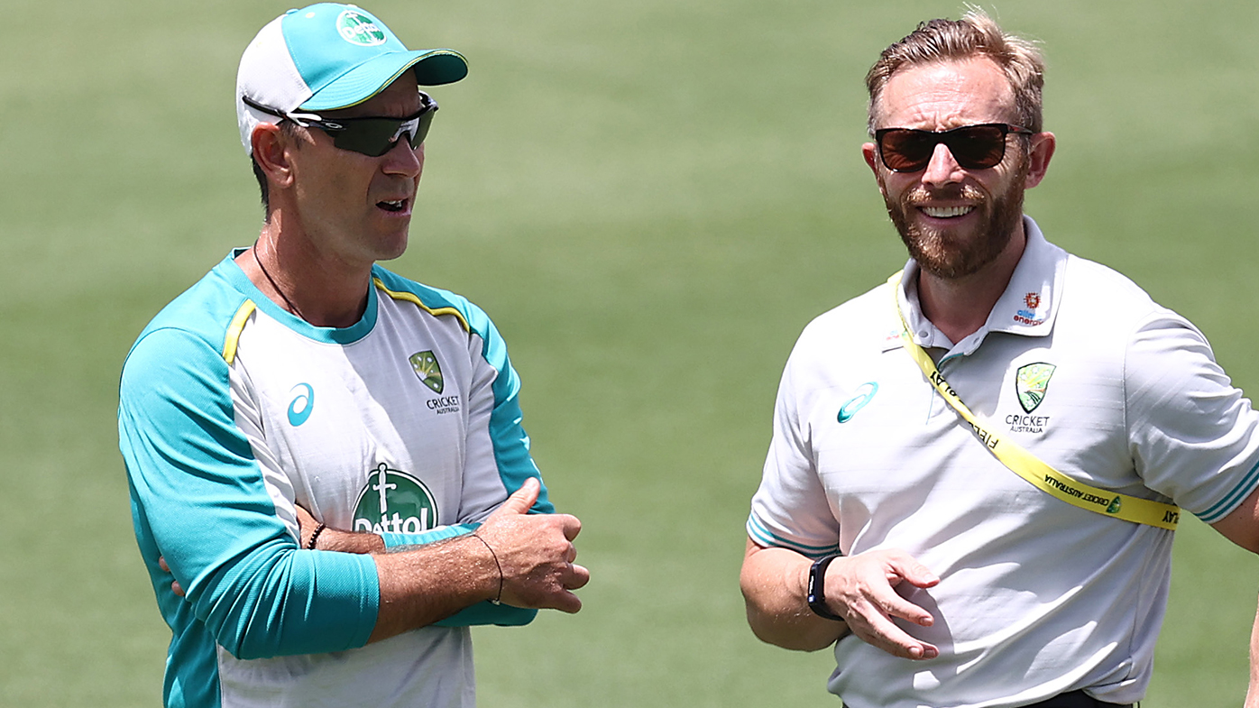 Former Australian coach Justin Langer with team manager Gavin Dovey.