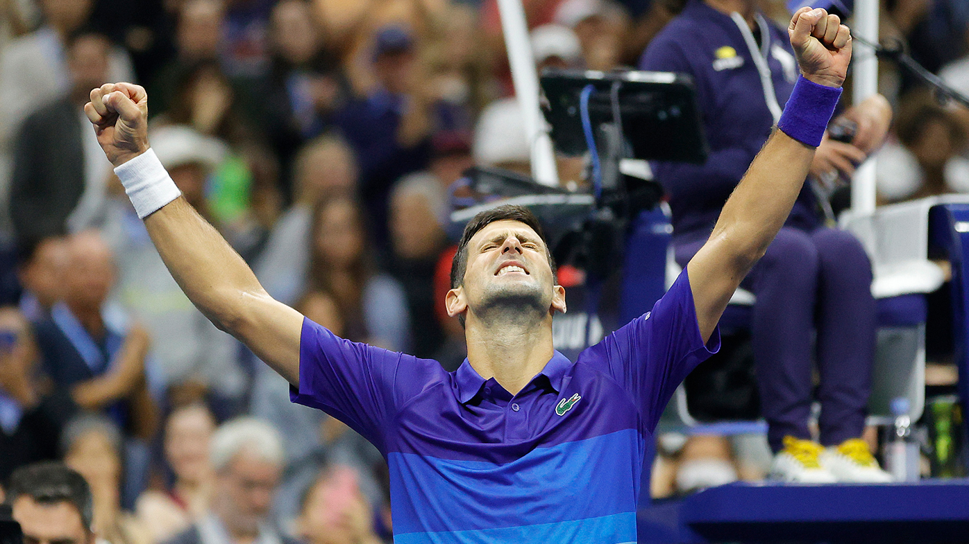 Novak Djokovic of Serbia celebrates winning match point to defeat Alexander Zverev of Germany 