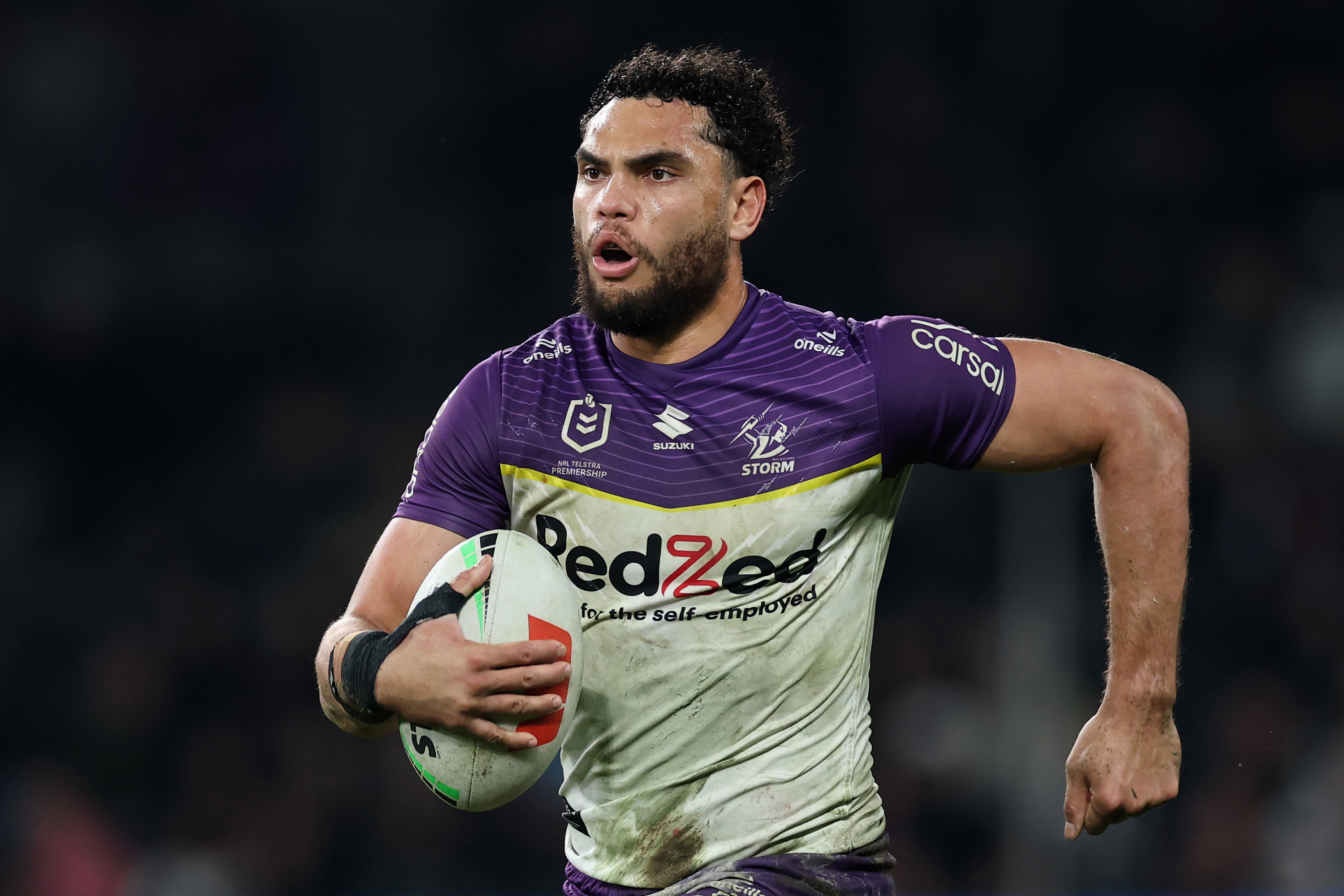 SYDNEY, AUSTRALIA - AUGUST 14: Xavier Coates of the Storm makes a break to score a try during the round 24 NRL match between Penrith Panthers and Melbourne Storm at CommBank Stadium on August 14, 2025 in Sydney, Australia. (Photo by Cameron Spencer/Getty Images)