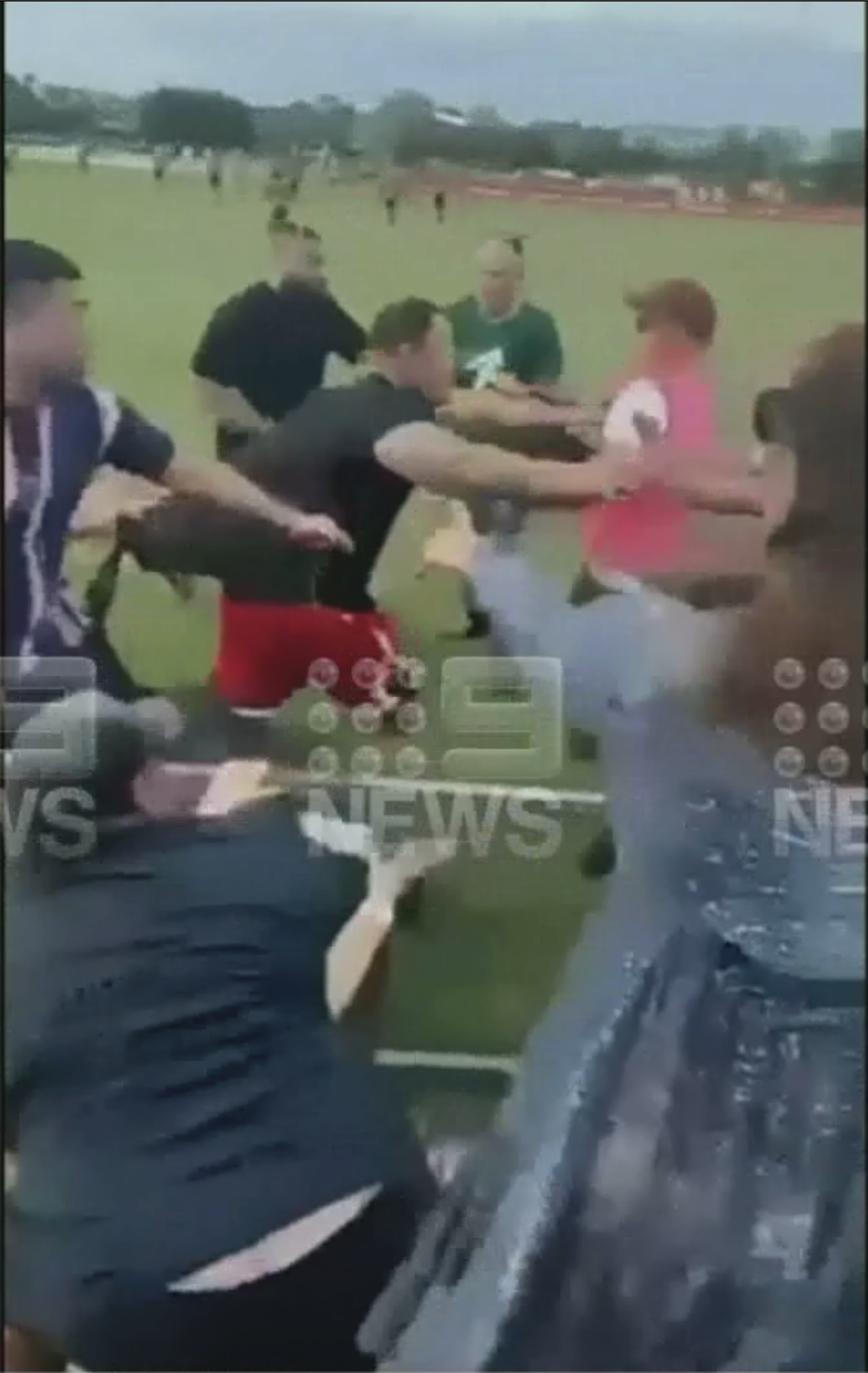 A Brisbane father has sustained serious injuries following a wild brawl at a junior rugby league game over the weekend, with new footage showing the escalation of the altercation. 