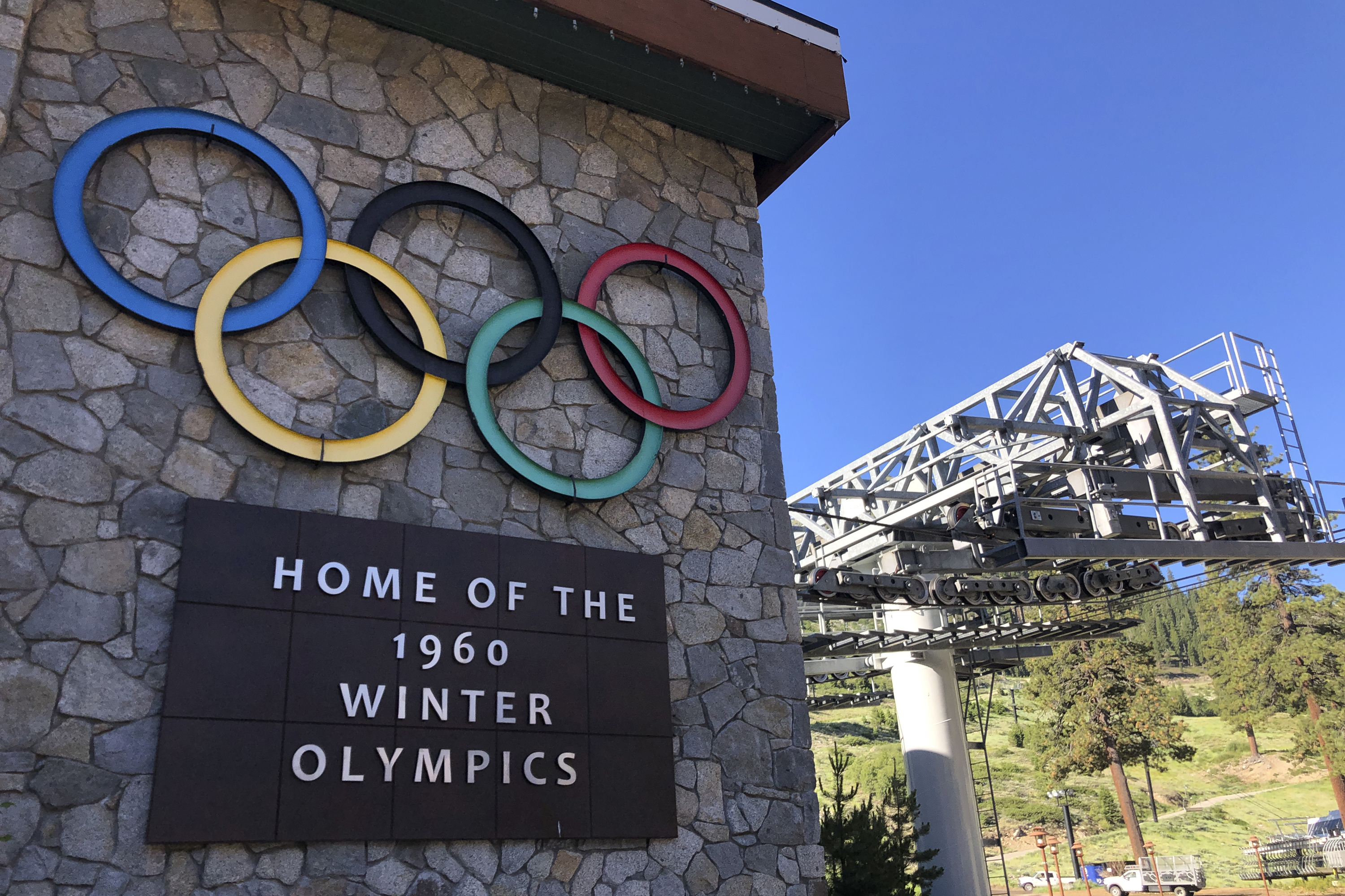 A sign marking the 1960 Winter Olympics is seen by a chairlift at Squaw Valley Ski Resort in Olympic Valley.