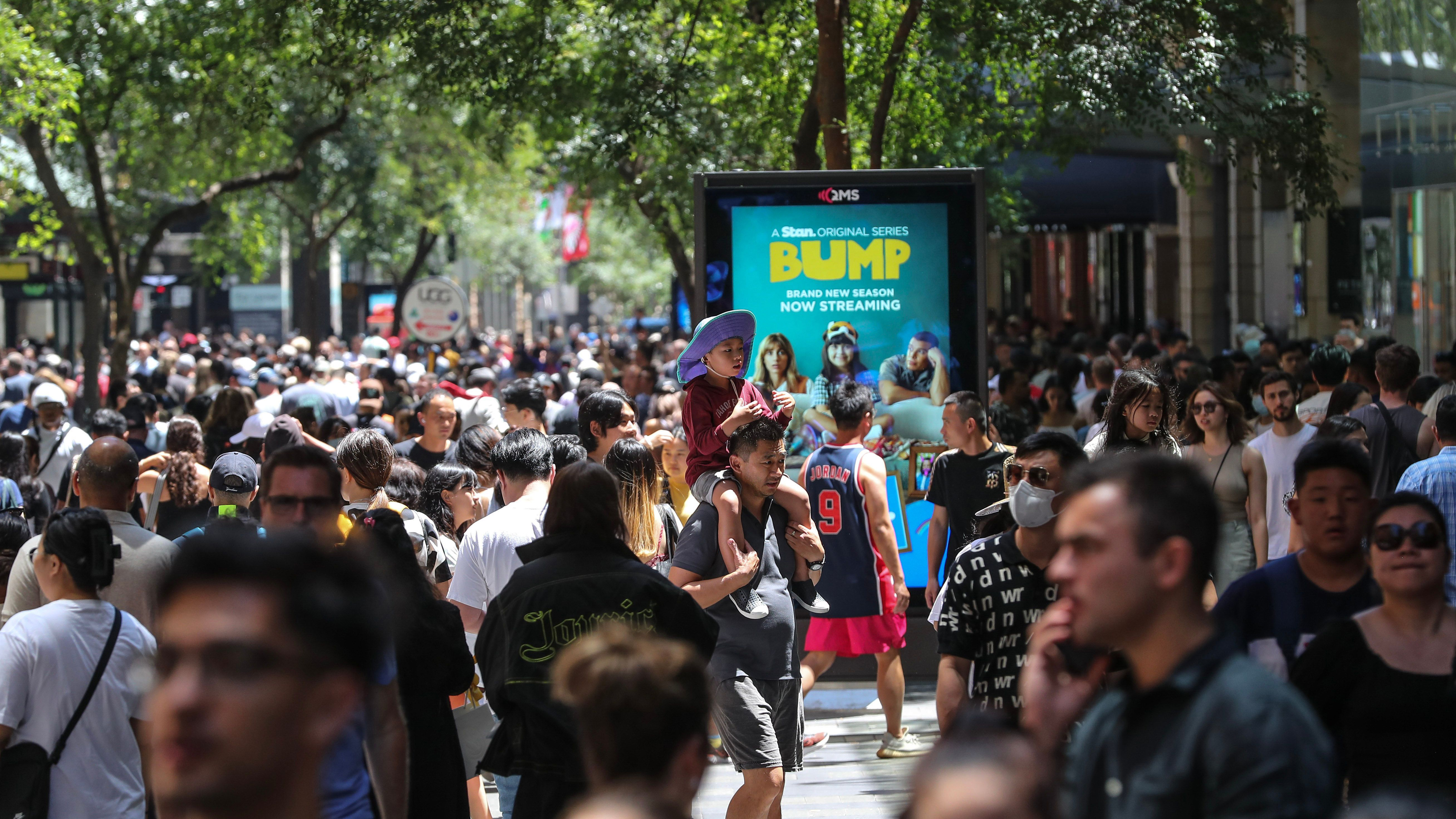 People flock to Pitt Street Mall during Boxing Day sales in Sydney, Australia. 