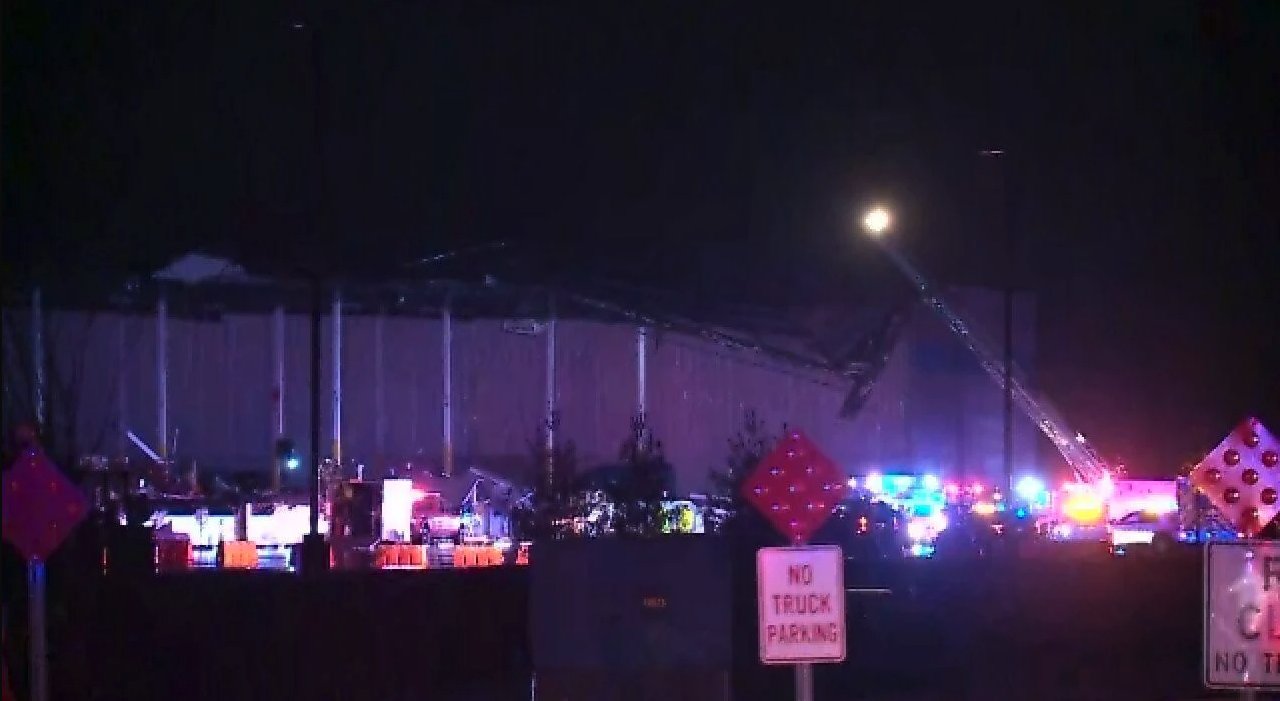 This image shows damage at an Amazon building in Edwardsville, Illinois, following a night of storms.