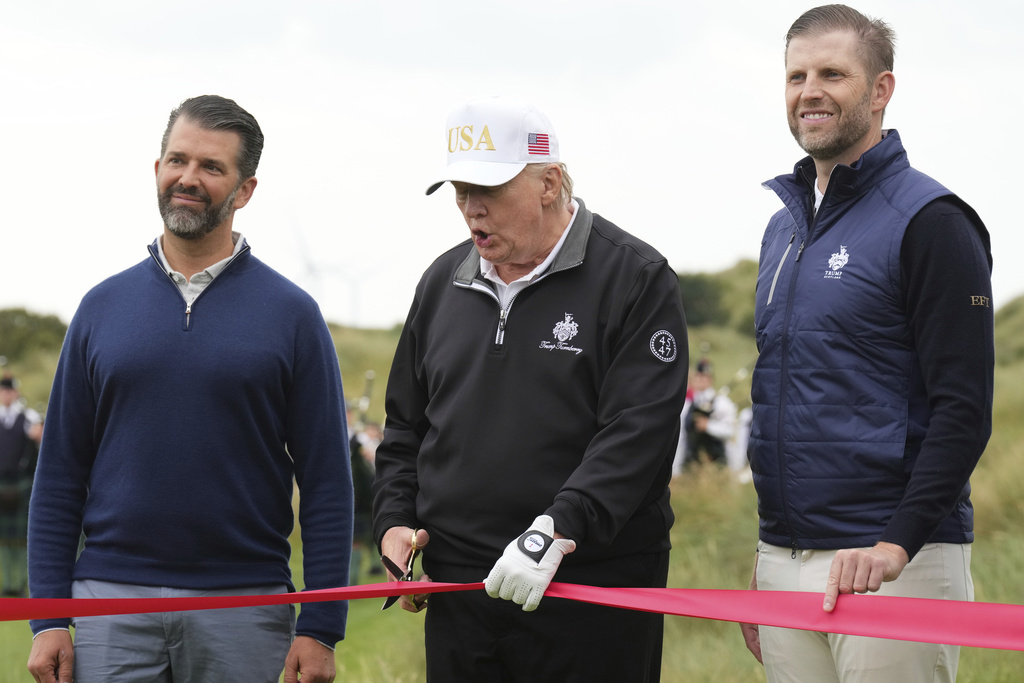 (L-R): Donald Trump Jr. ; US President Donald Trump; Eric Trump