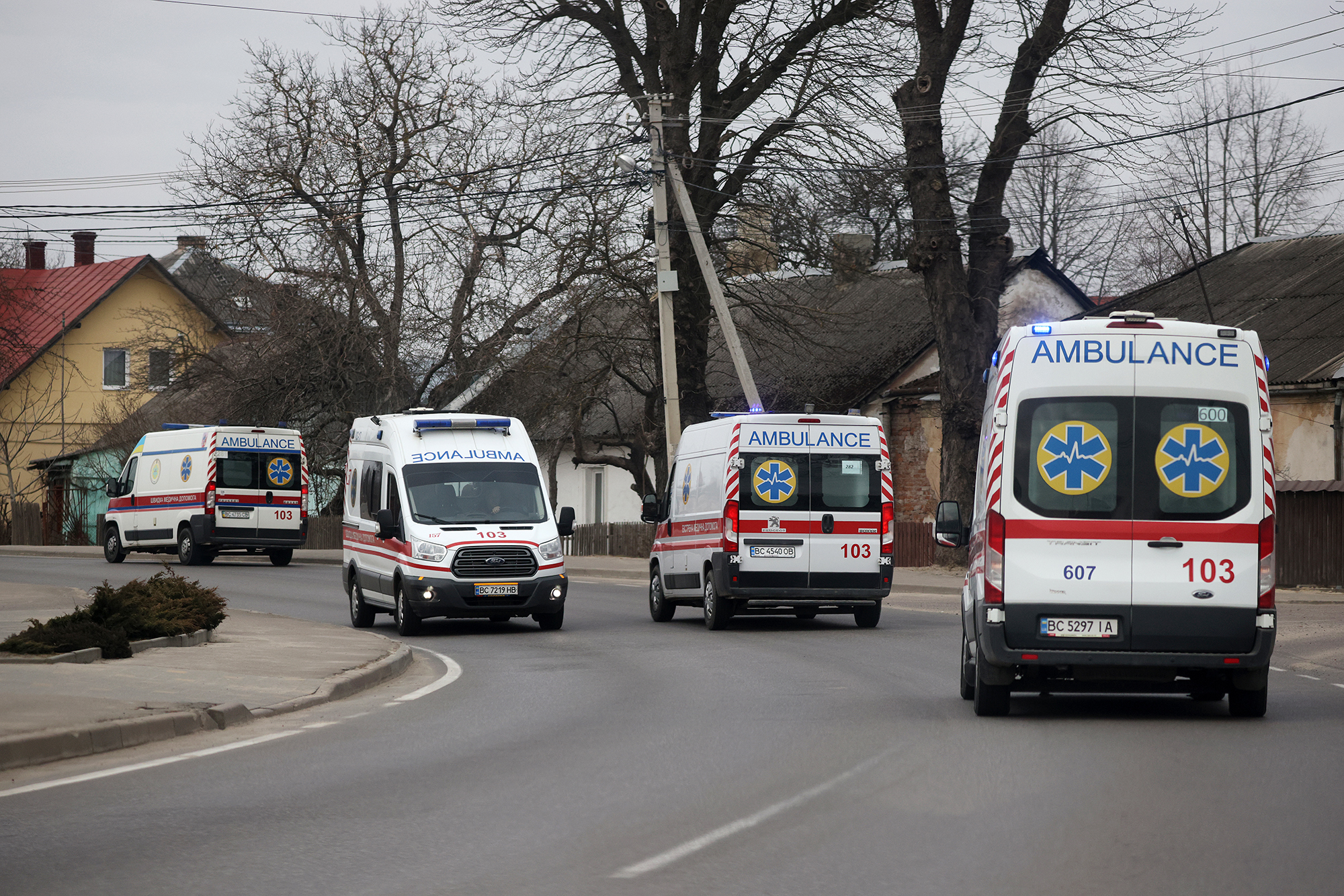 Ambulances are seen traveling to and from the Yavoriv military facility on March 13, 2022 in Novoiavorivsk, Ukraine.(Photo by Dan Kitwood/Getty Images)