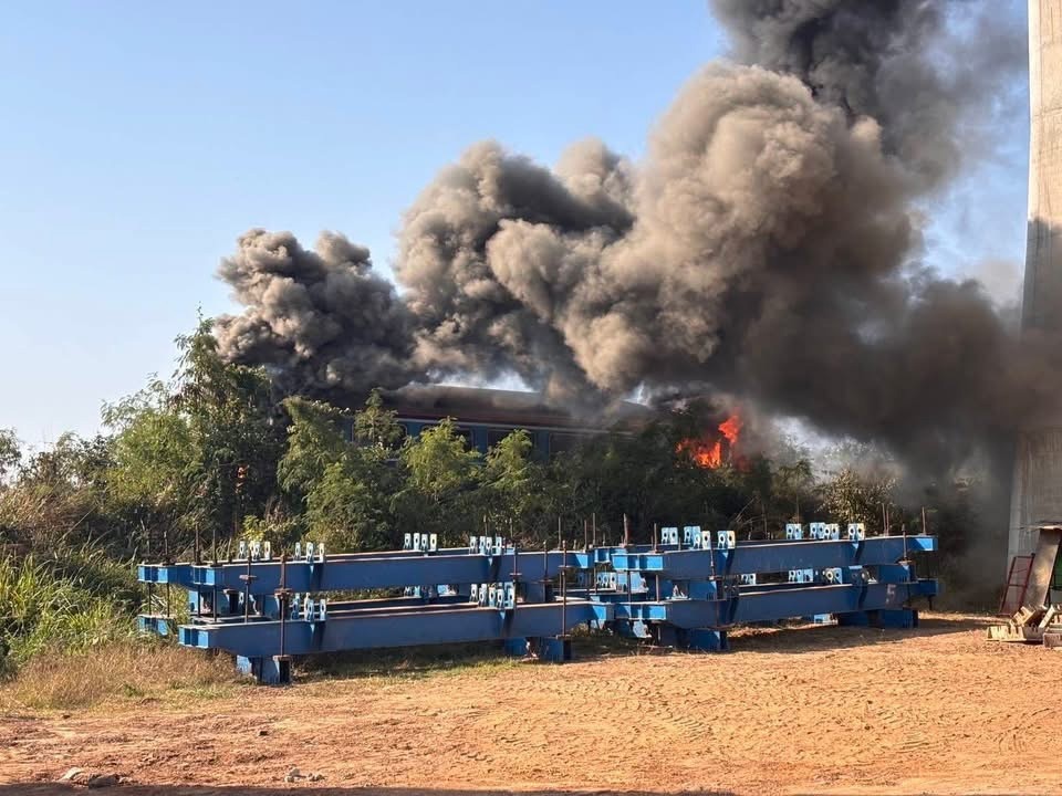 Photos published in Thai media showed plumes of white then dark smoke above the scene, and construction equipment hanging down from between two concrete support pillars.