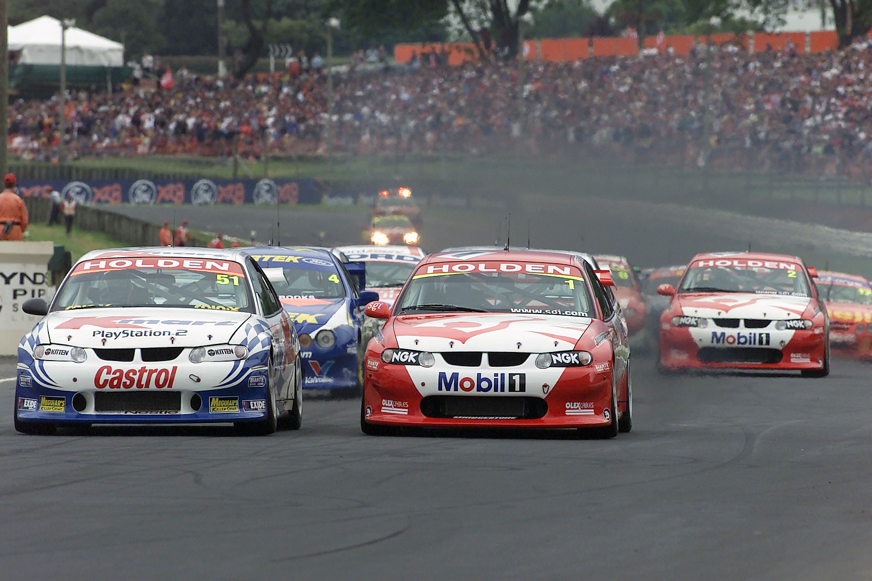 Greg Murphy (No.51) in his Holden Commodore VX races down the straight next to championship winner Mark Skaife (No.1) at Pukekohe Park.