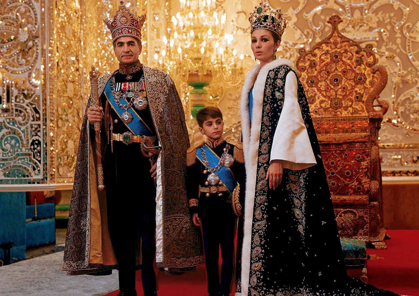The Shah of Iran, Mohammad Pahlavi with his wife and son Reza.