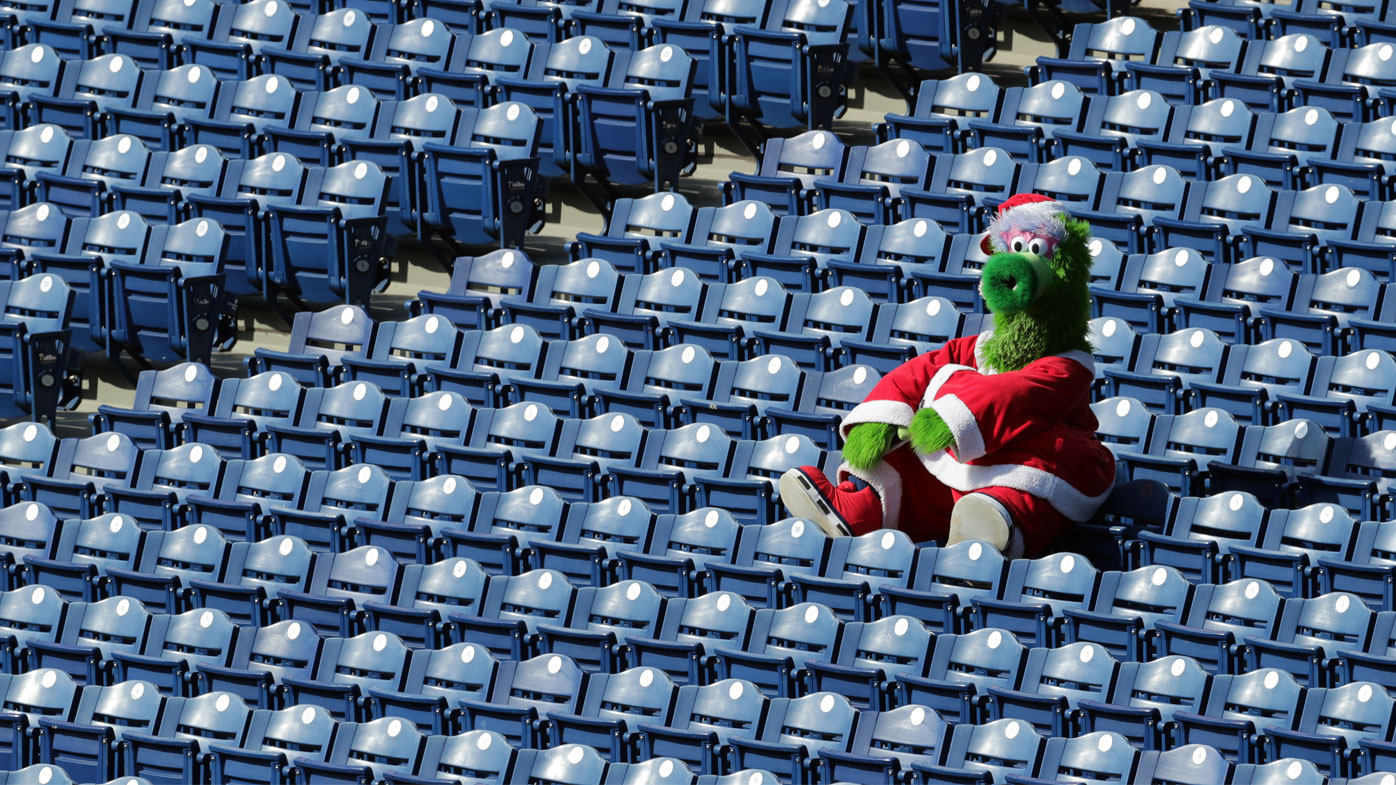 The Phillie Phanatic sits alone in the stands during a game between the Miami Marlins and the Philadelphia Phillies