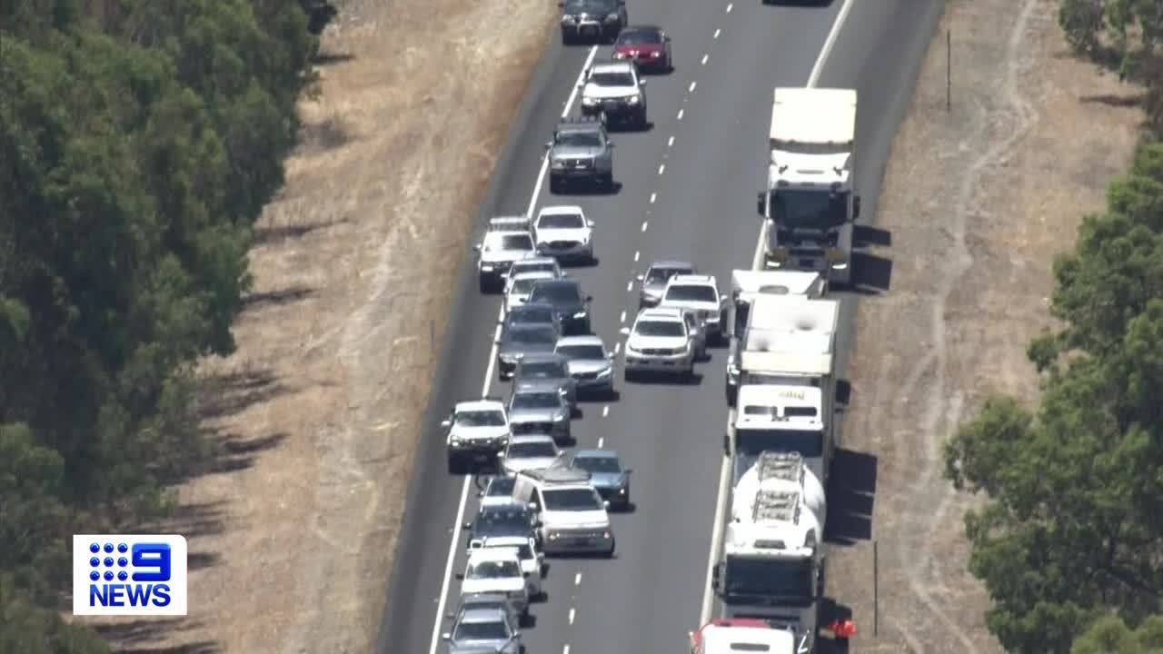 A road train has jackknifed and caused a pool to smash into a car's windscreen on a highway south of Perth.