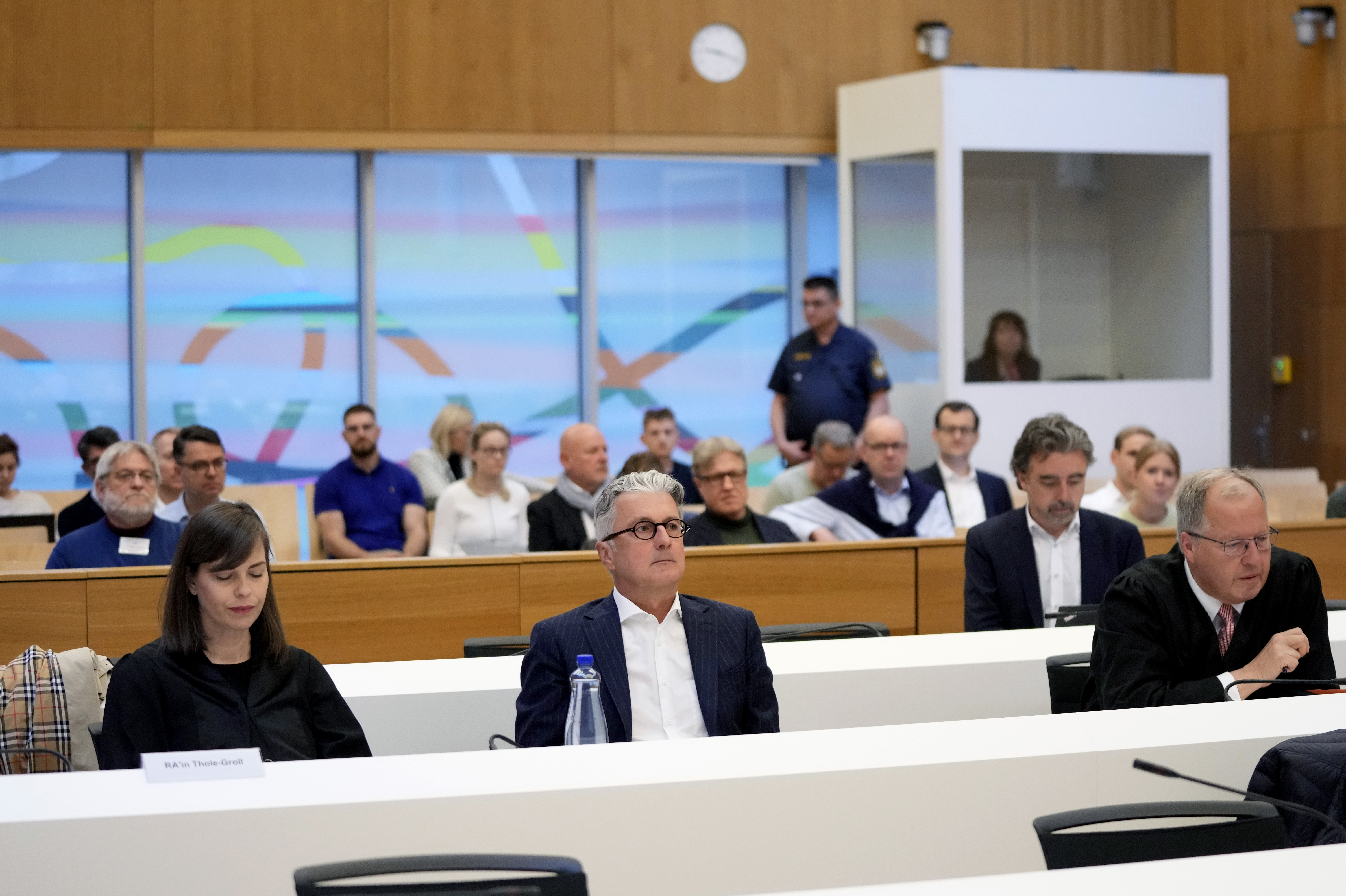 Rupert Stadler, former CEO of German car manufacturer Audi, centre, sits in a regional court room in Munich, Germany, Tuesday, May 16, 2023