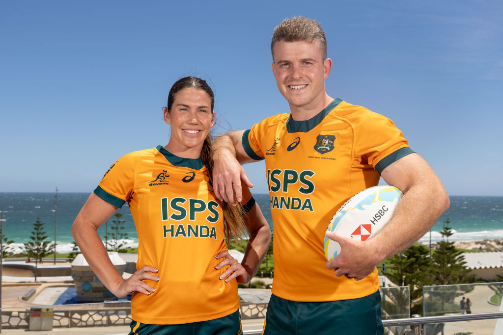 Charlotte Caslick and Nick Malouf of Australia pose at Rendezvous Hotel.