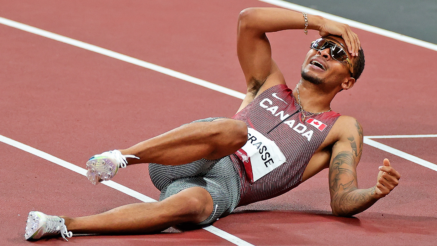 Andre De Grasse of Team Canada celebrates winning the Men's 200m Final 