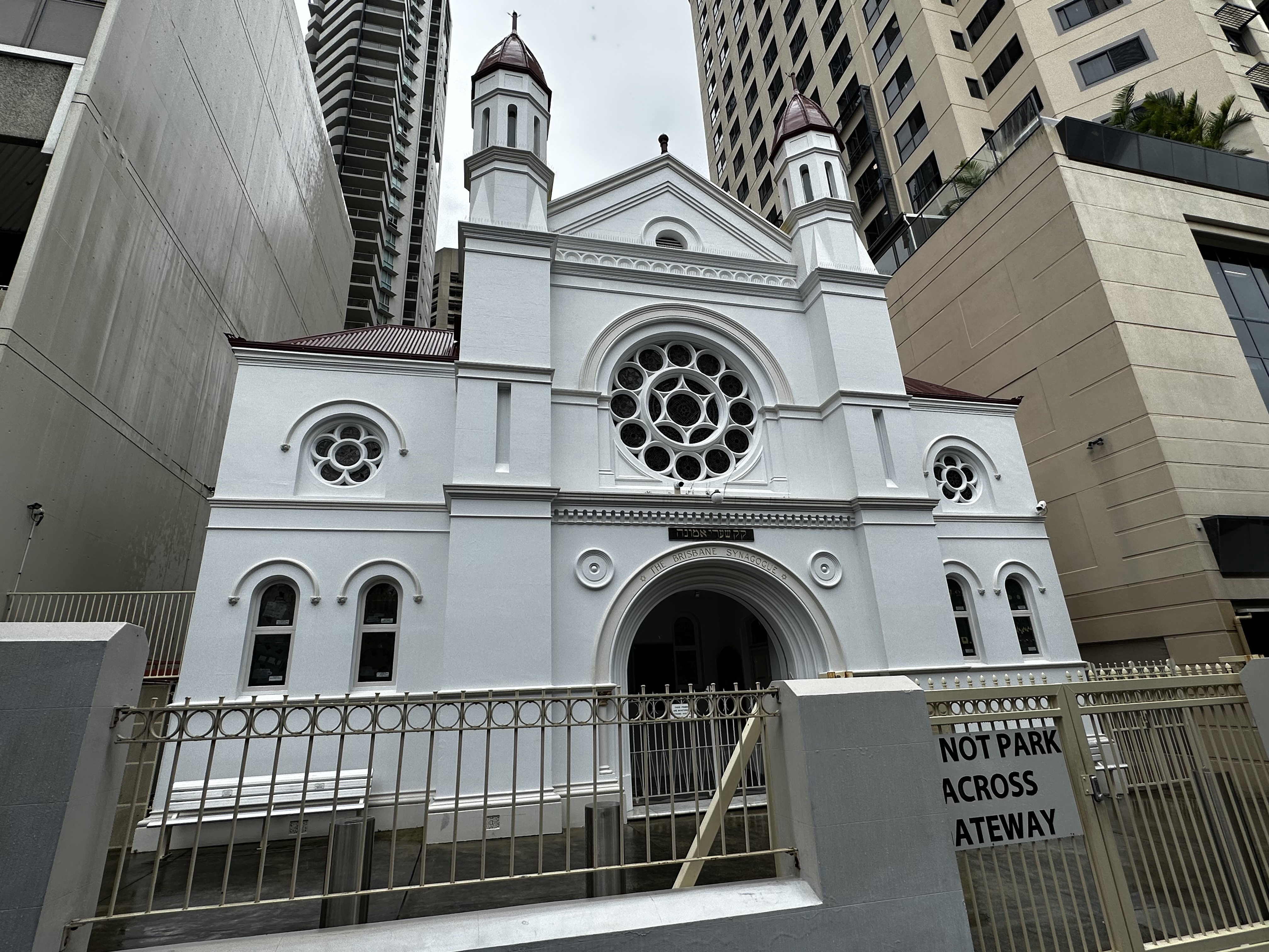The gates of the Brisbane synagogue were allegedly rammed by a black ute.
