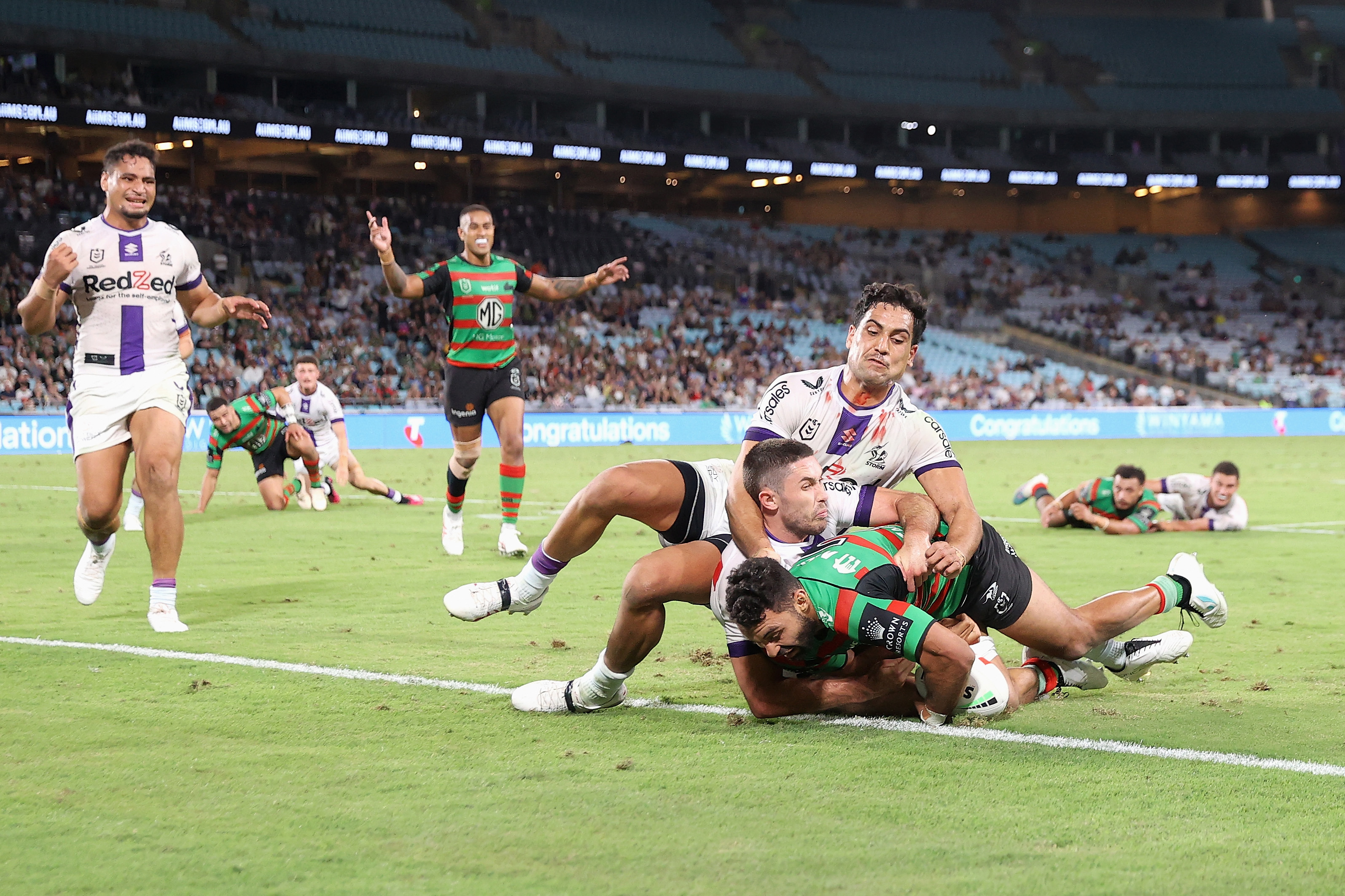 Alex Johnston loses the ball over the tryline as Nick Meaney comes in to spoil.