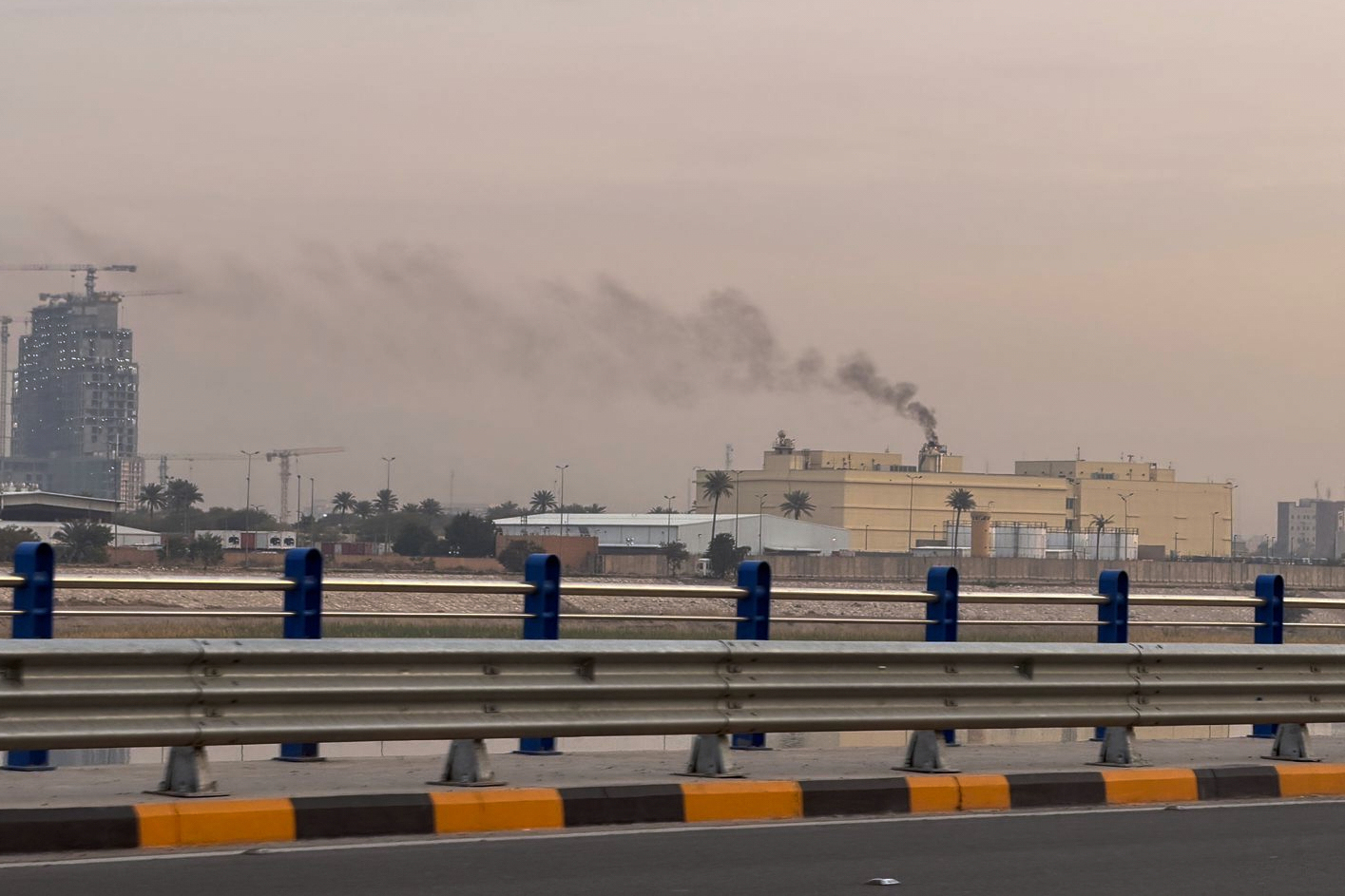 Smoke rises from the U.S. embassy building in Baghdad, Iraq