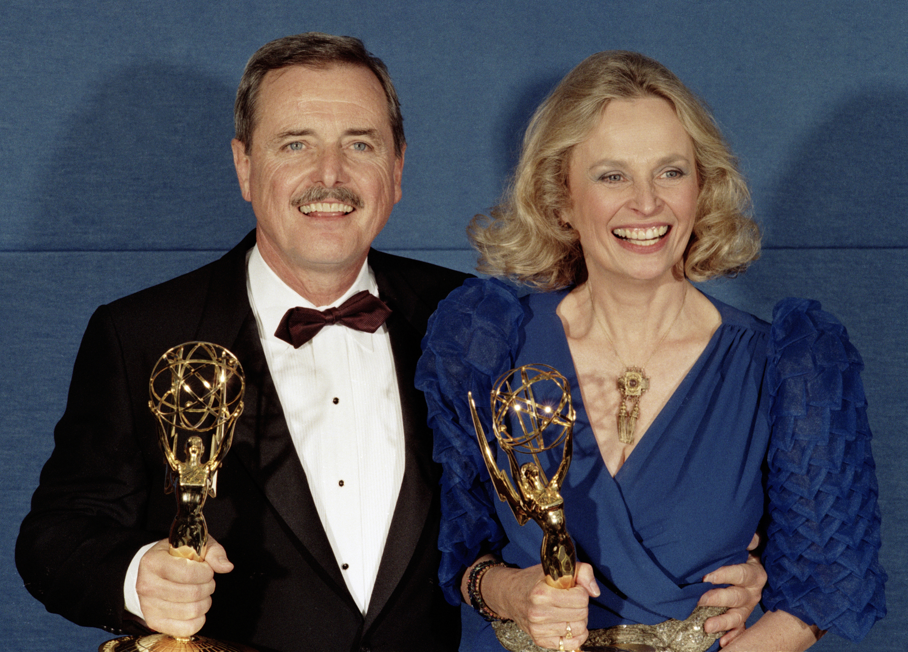 Emmy Winners and real-life husband and wife William Daniels and Bonnie Bartlett celebrate their Emmy Awards backstage at the Emmy Awards Show, September 21, 1986 in Pasadena, California. 