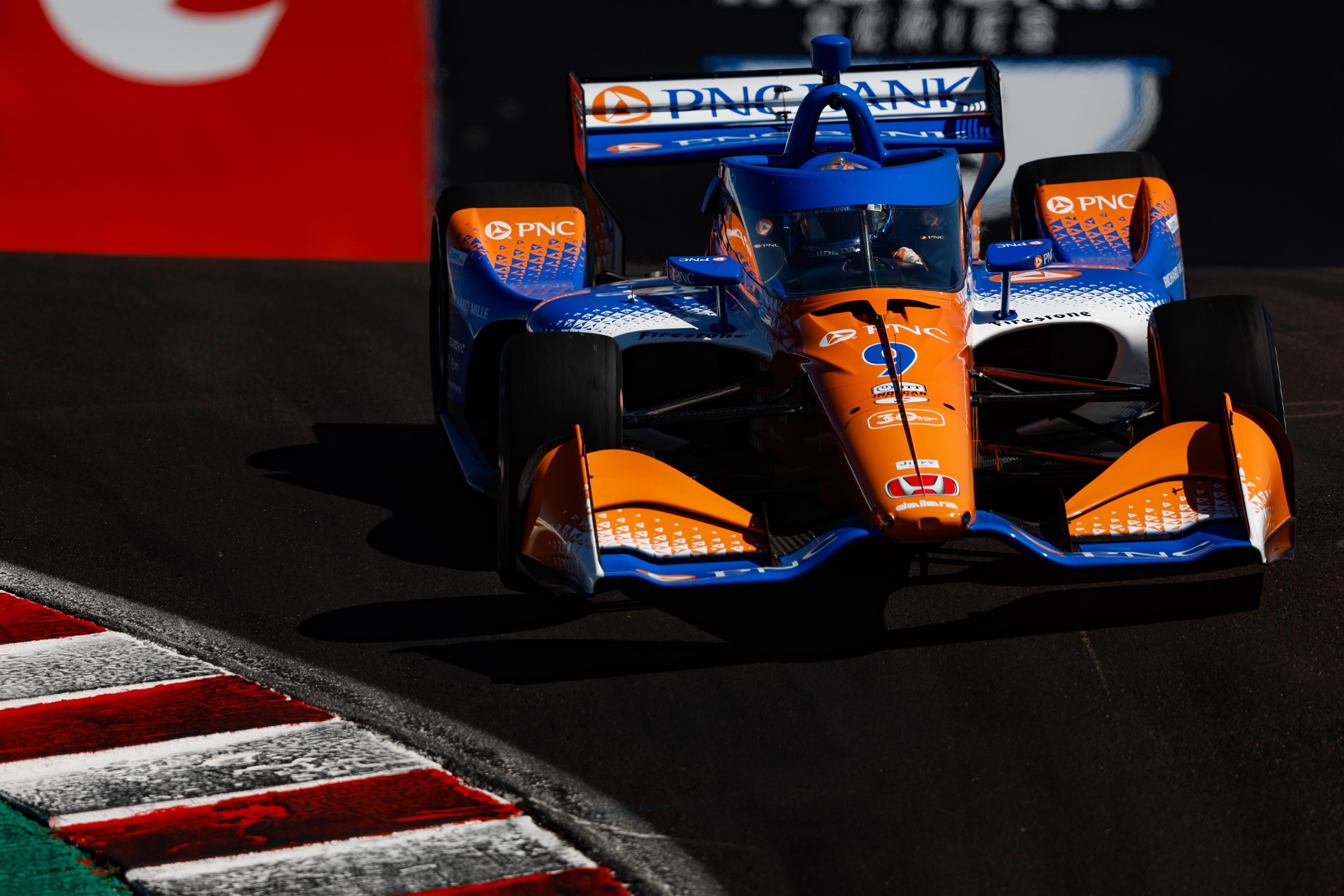 Scott Dixon at the Corkscrew at Laguna Seca.