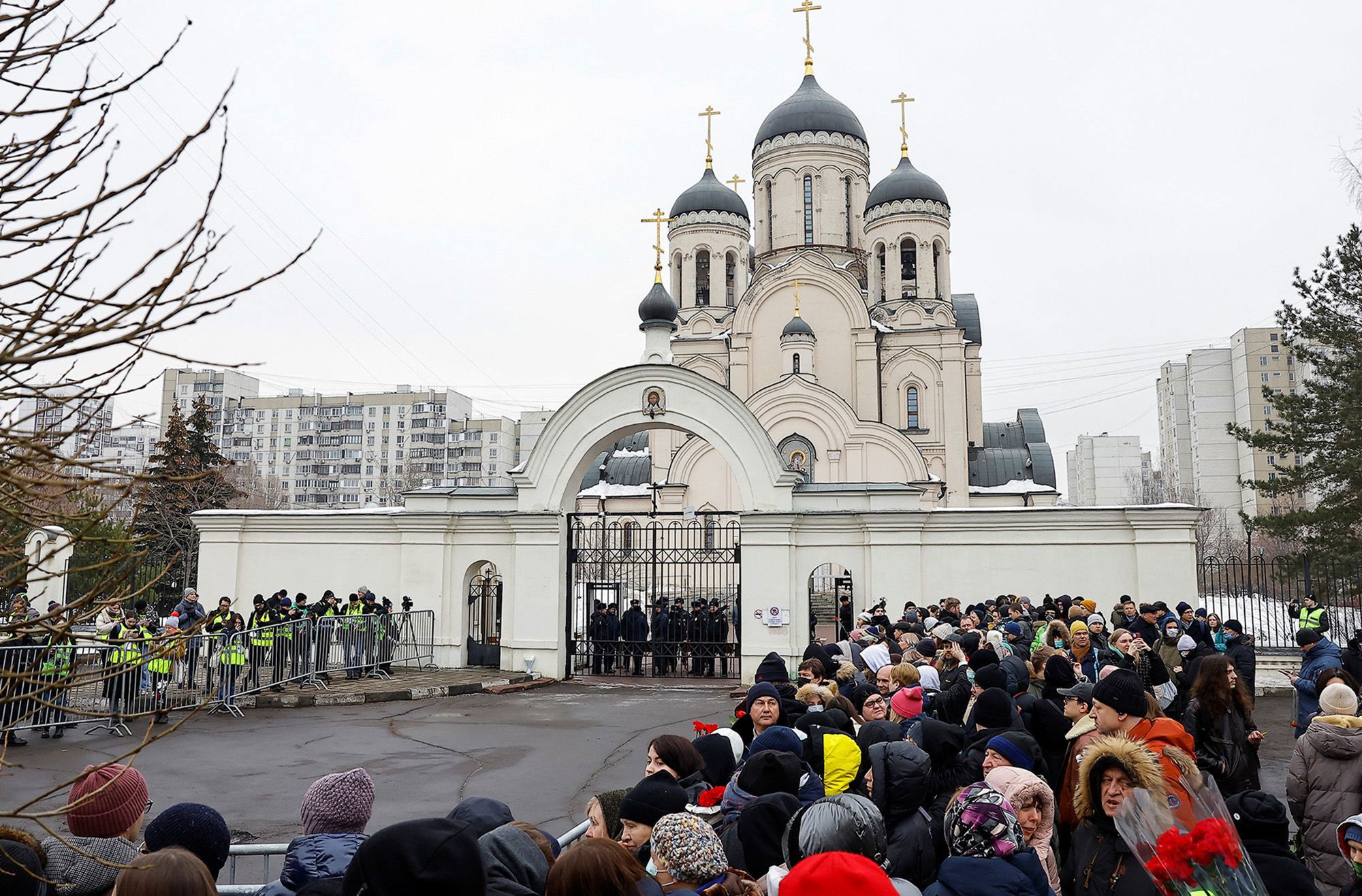 People gather outside a Moscow church ahead of Navalny's funeral amid heavy police presence, March 1.